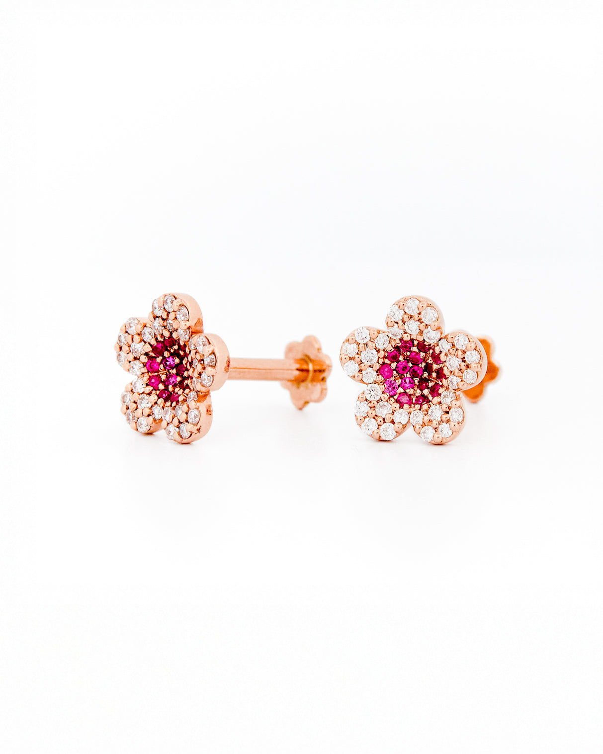 beautiful gold cherry blossom flower earrings on white background