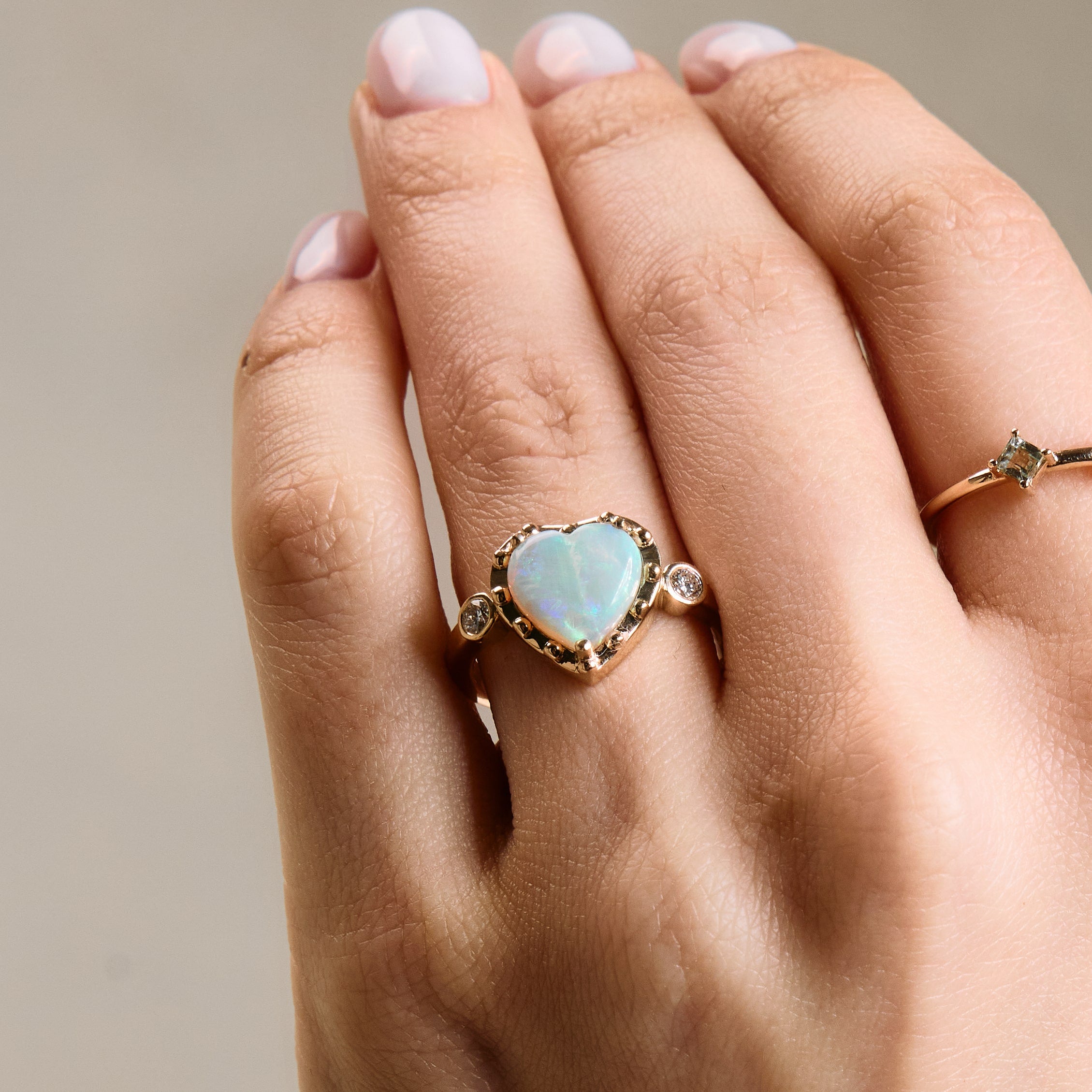 Gold rings with Australian Opals on hand