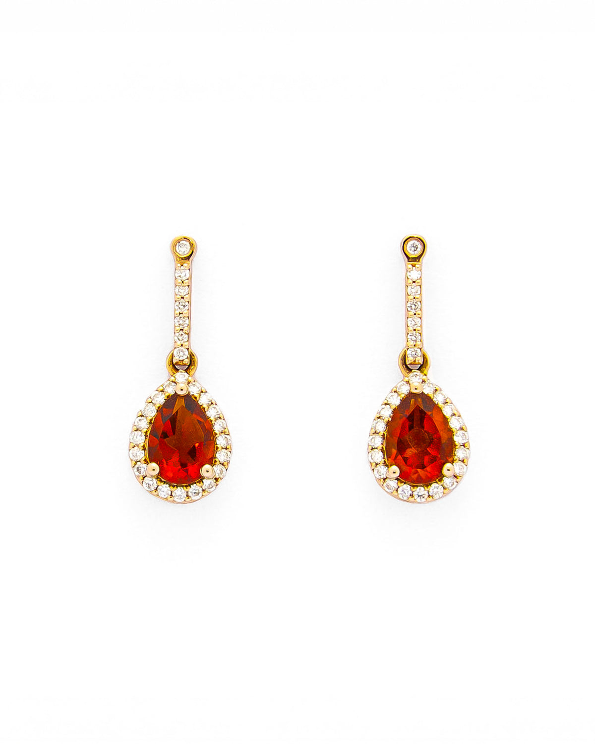 teardrop earring in yellow gold with diamonds and a teardrop fiery citrine