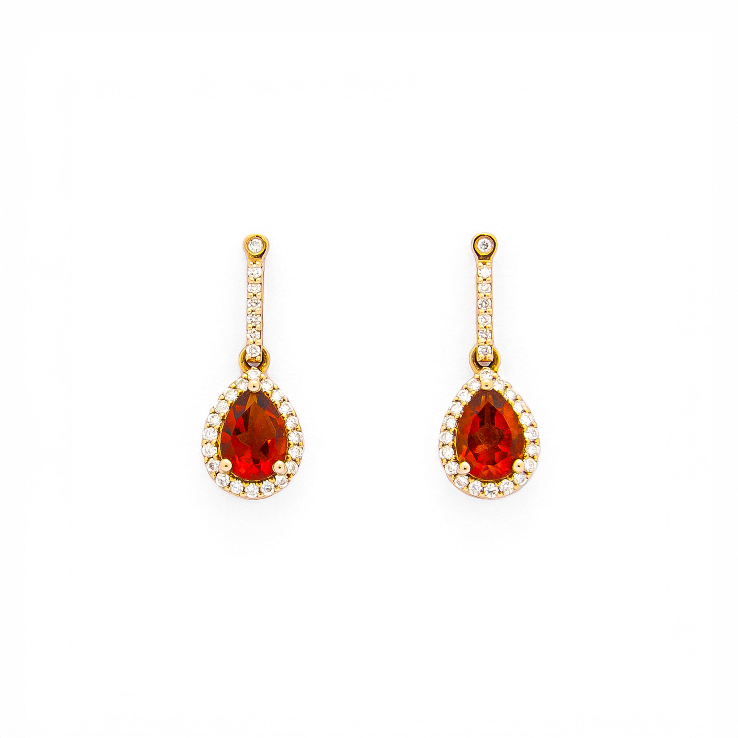 teardrop earring in yellow gold with diamonds and a teardrop fiery citrine
