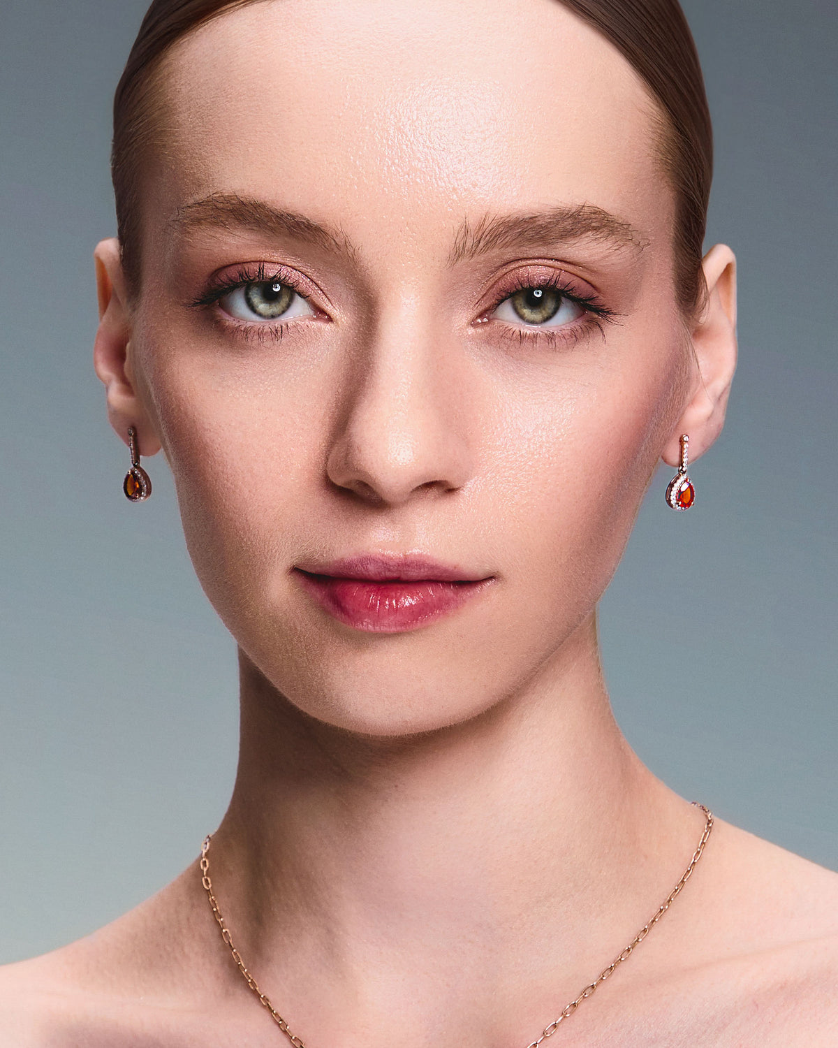 teardrop earring worn by beautiful model