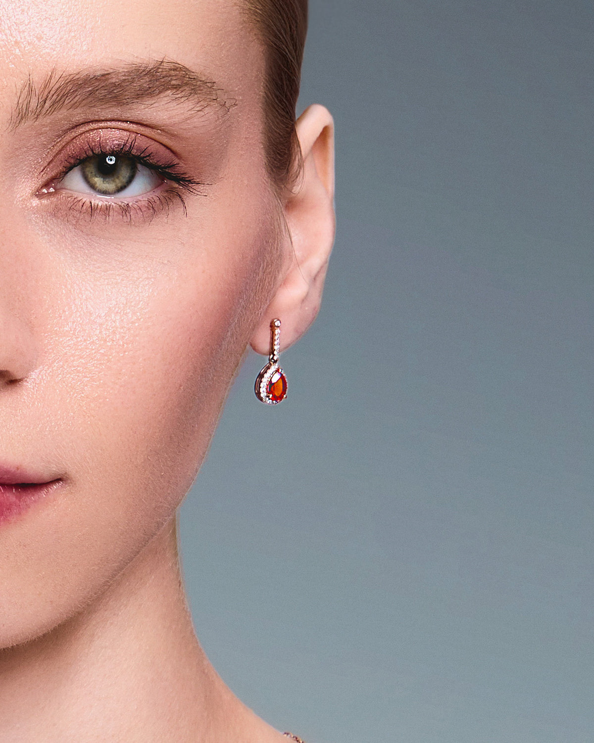 teardrop earring on beautiful models ear