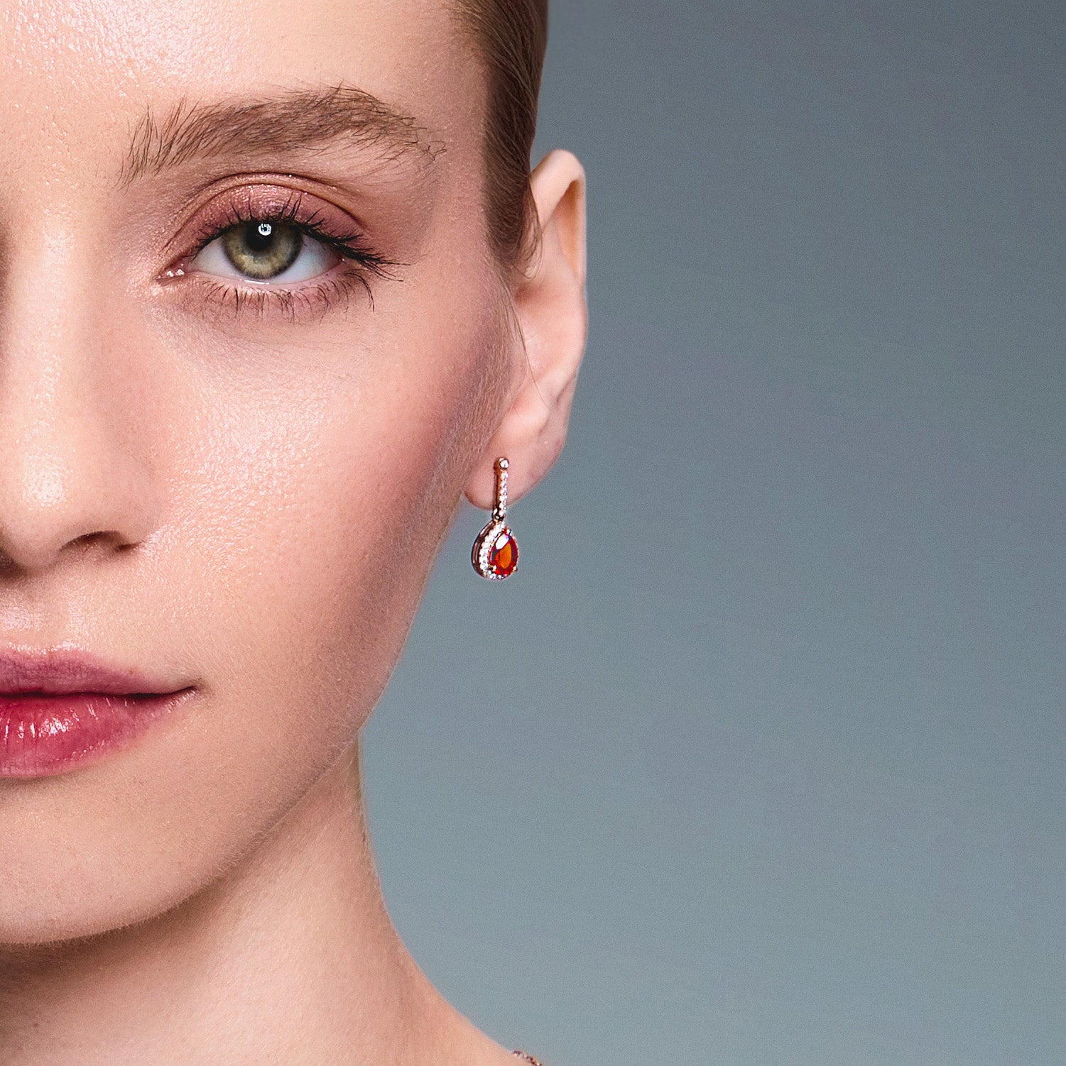 teardrop earring on beautiful models ear