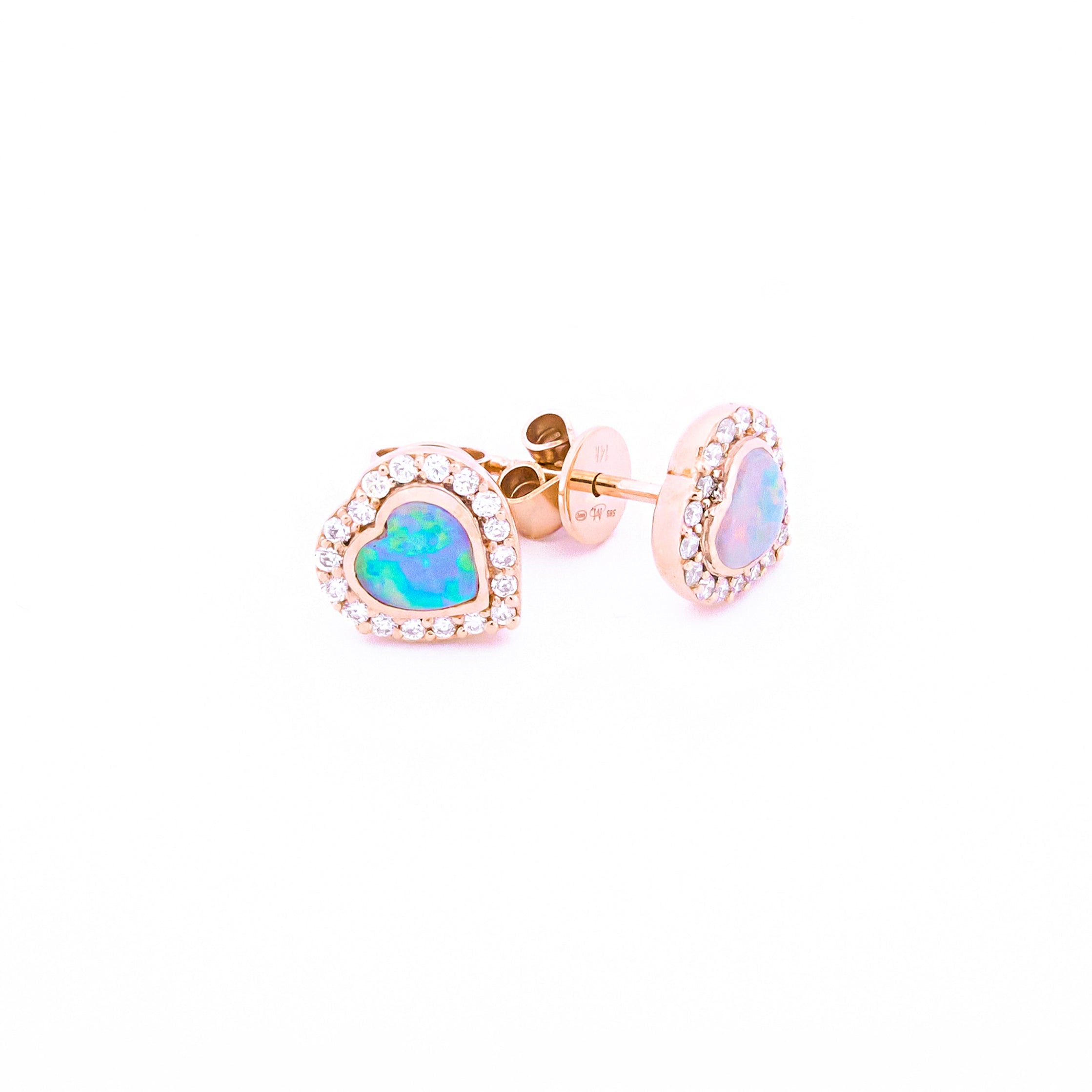 Heart-shaped Australian opal and Diamonds earrings in yellow gold on a white background