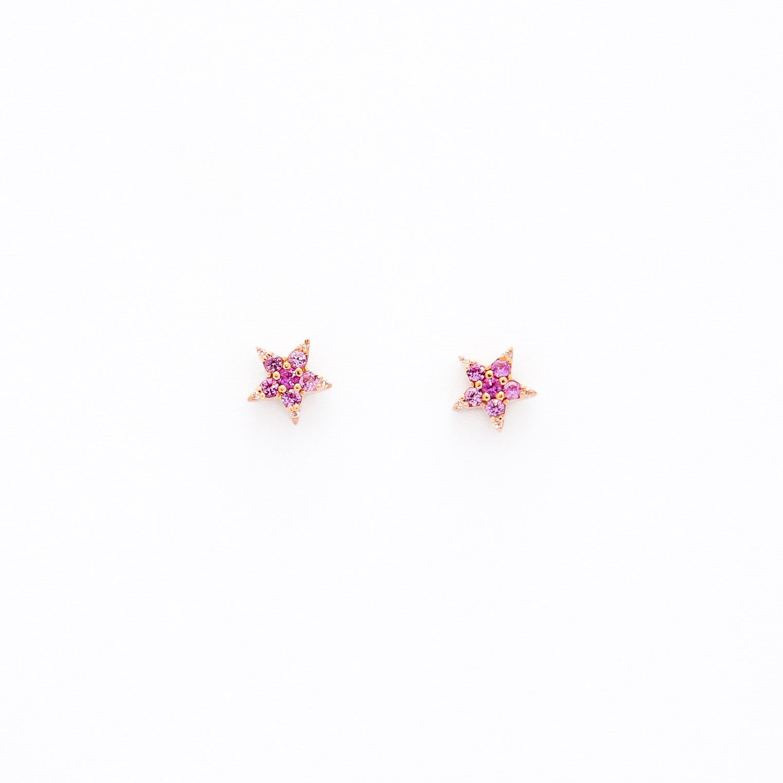 Pink sapphire and diamonds star studs earrings in pink gold