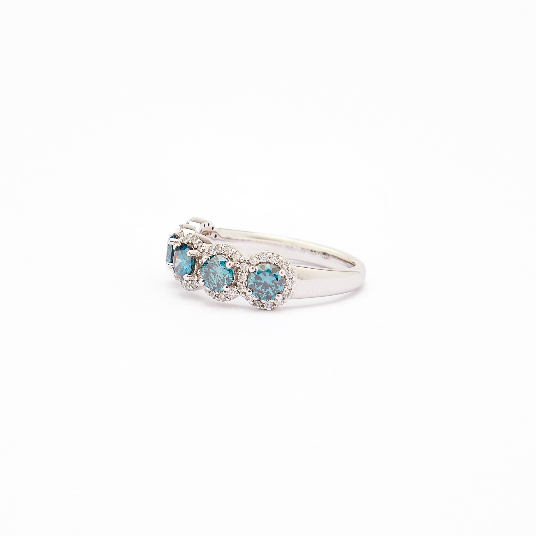 Blue Lab Diamonds and white diamonds ring in white gold, an absolutely mesmerising piece with five blue diamonds as the main stones, surrounded by white diamonds, divine.