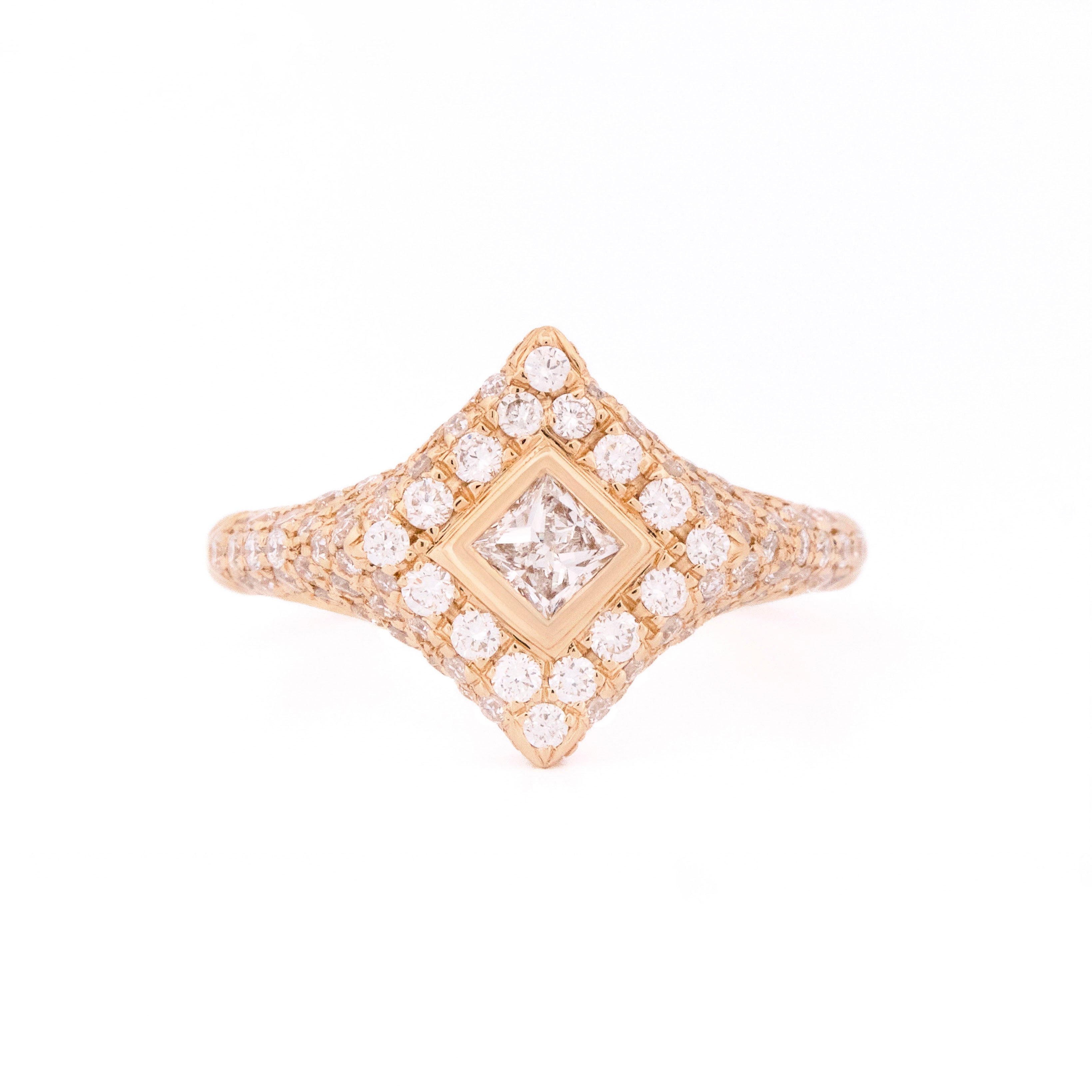 Rose gold ring with diamonds, rhombus and round shaped, on a white background