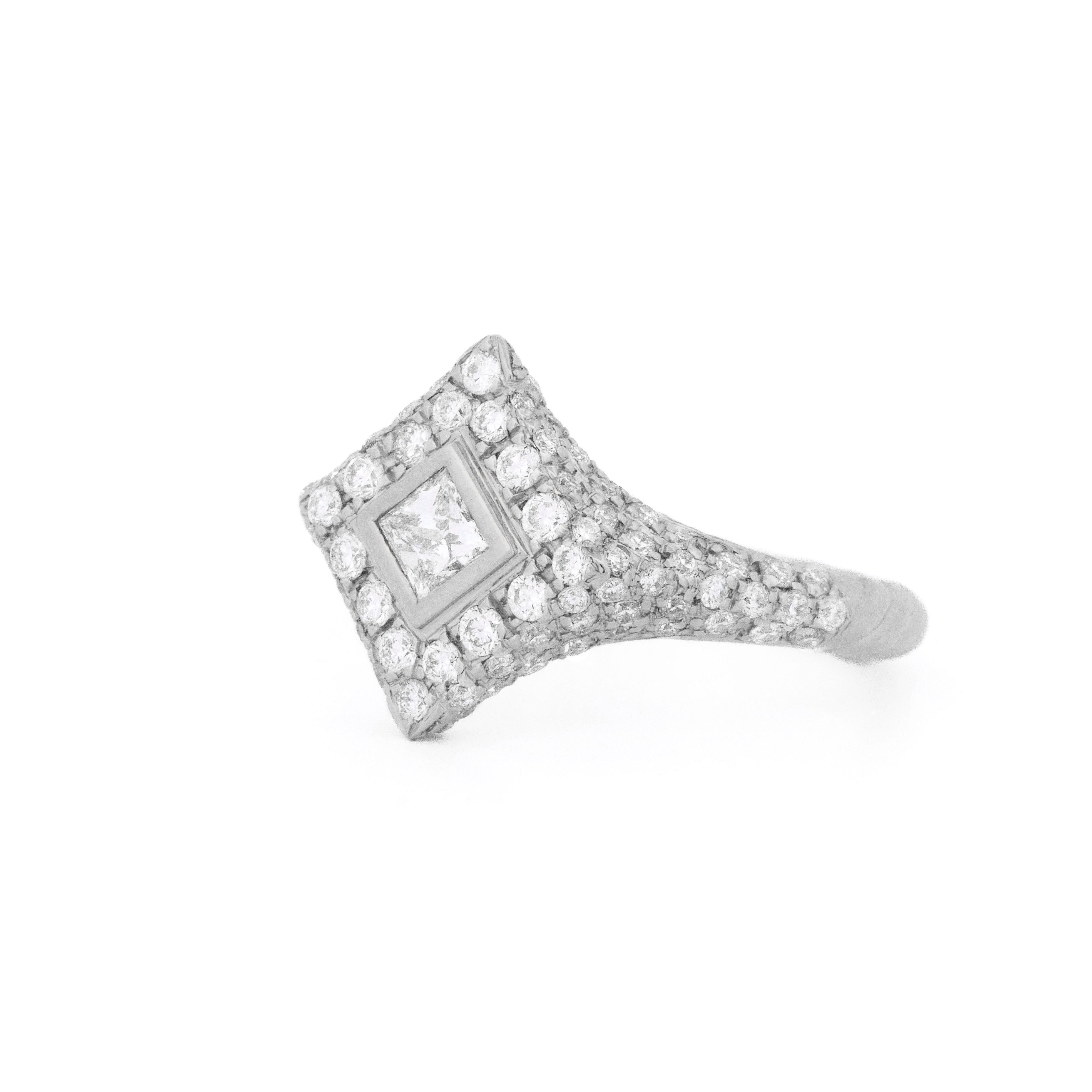 White gold ring with diamonds, rhombus and round shaped, on a white background