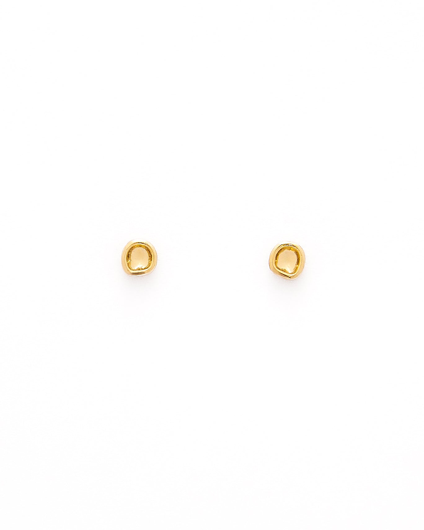 A pair of gold-colored studs earrings with a simple design, resembling a prayer bowl or birds' nest, displayed against a white background.