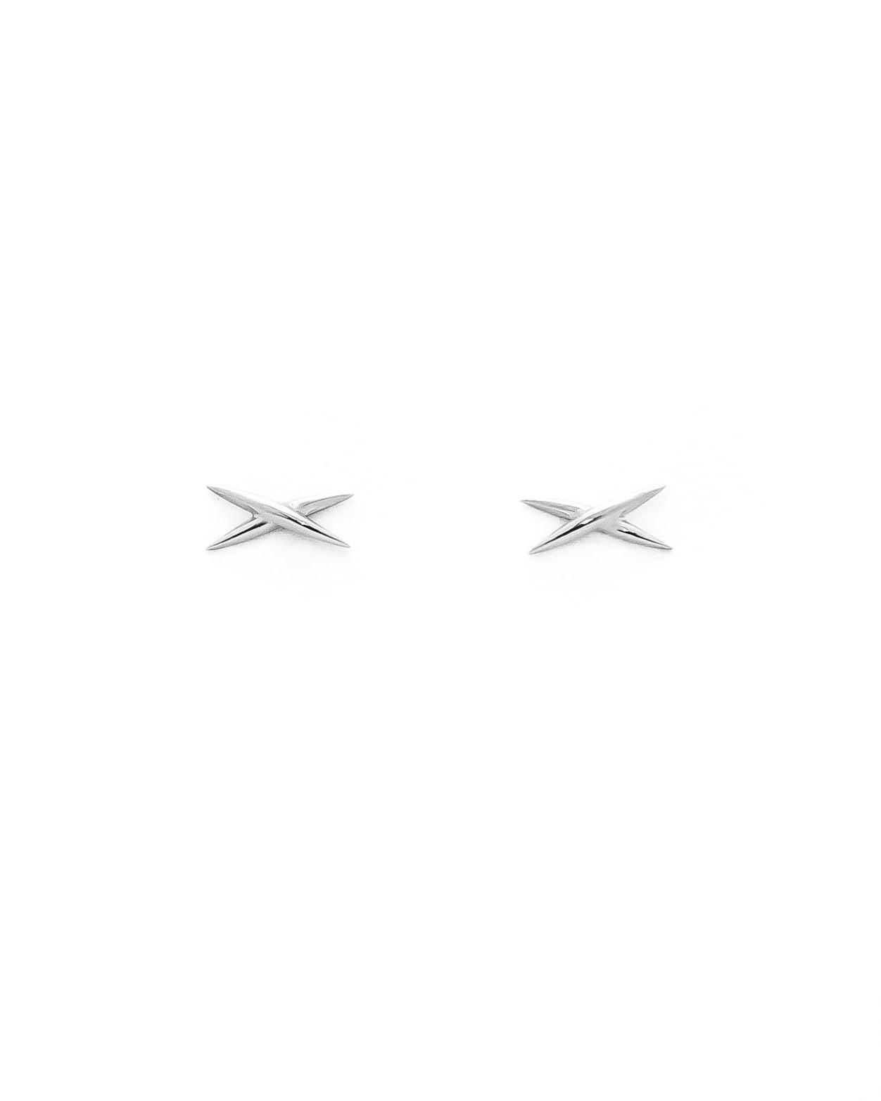 A pair of gold stud earrings shaped like an X on a white background.