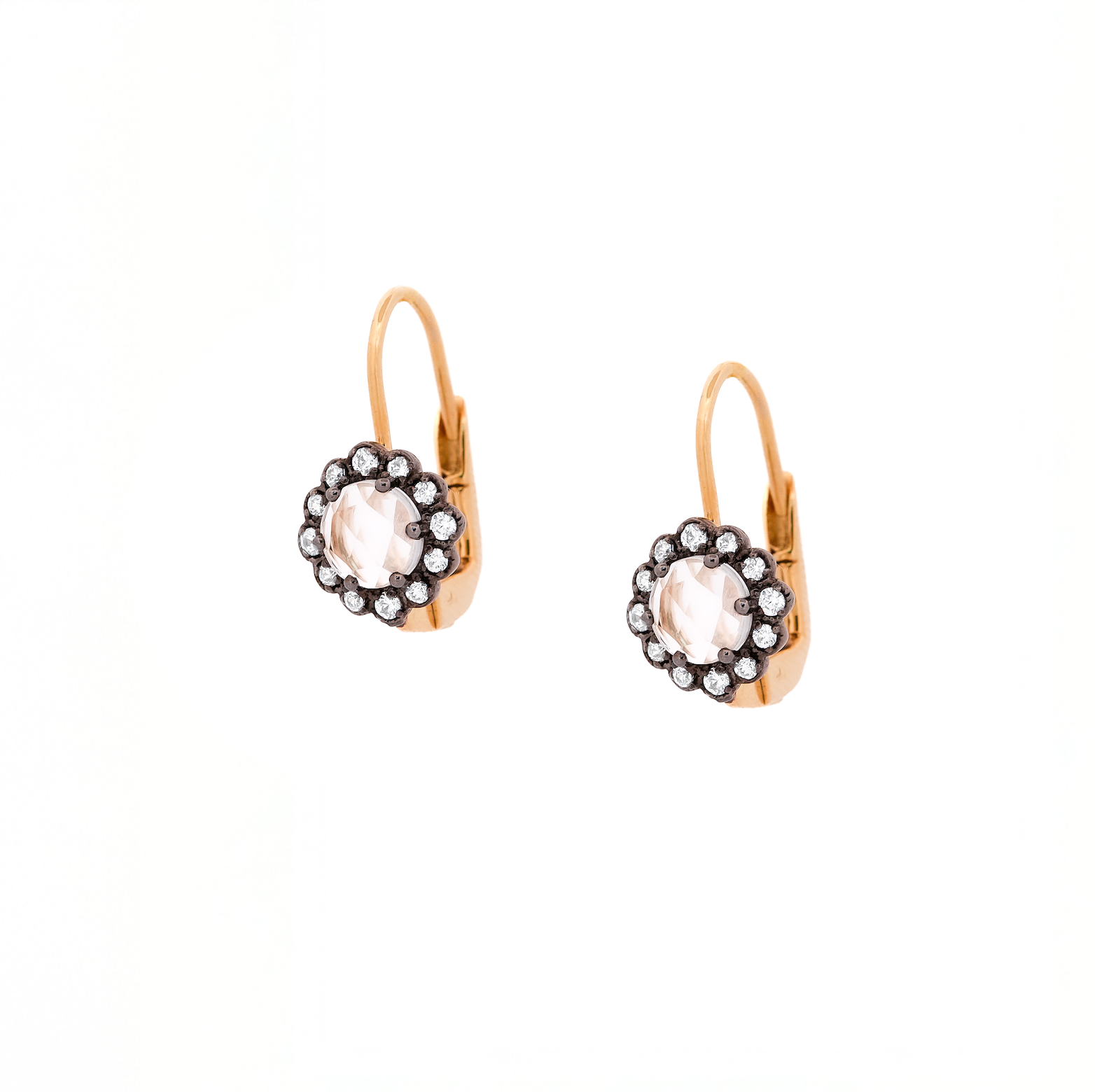 rose gold earrings with rose cut diamond as a center stone surrounded by am array of round diamonds set in a black gold flower setting.