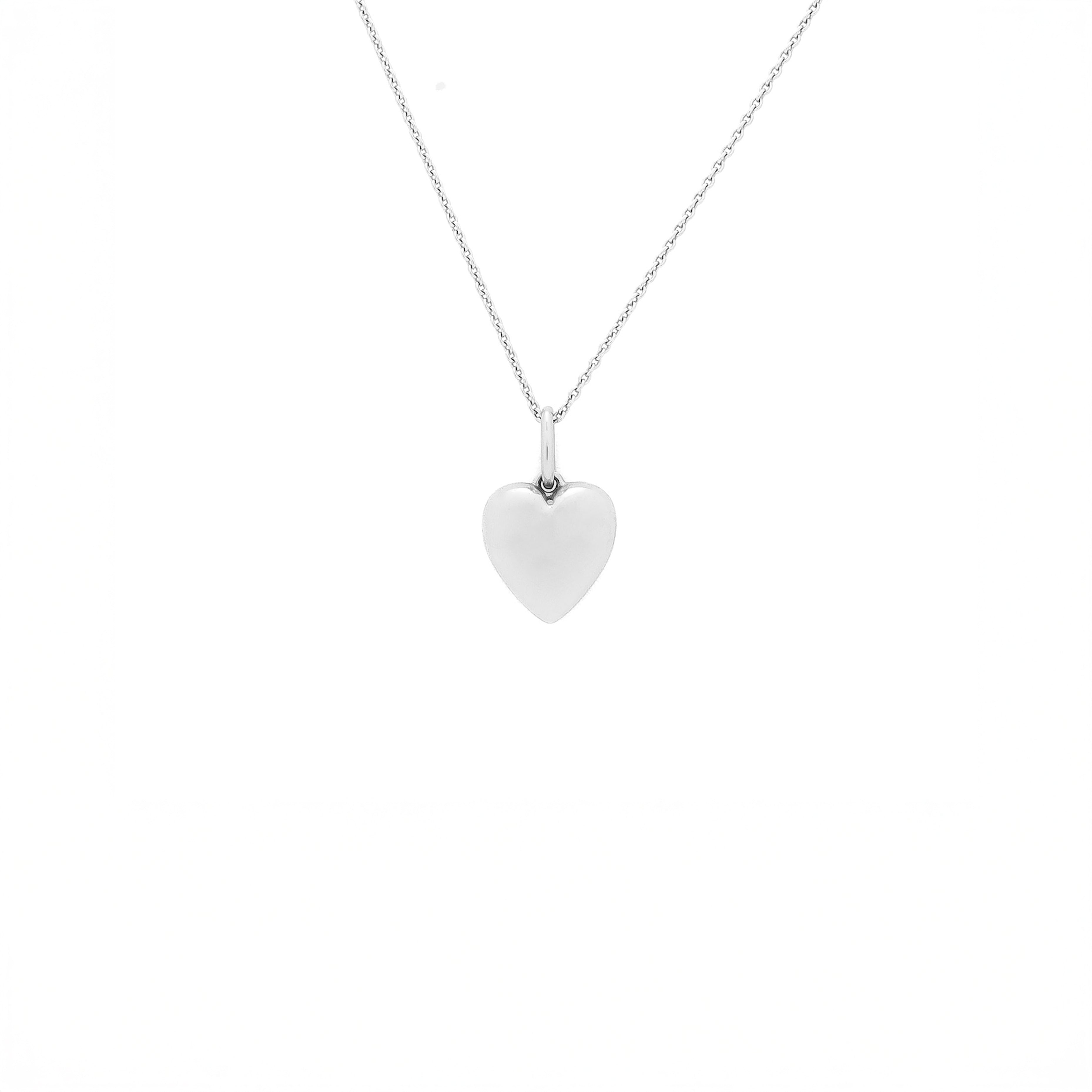 white gold Heart-shaped pendant on a white background