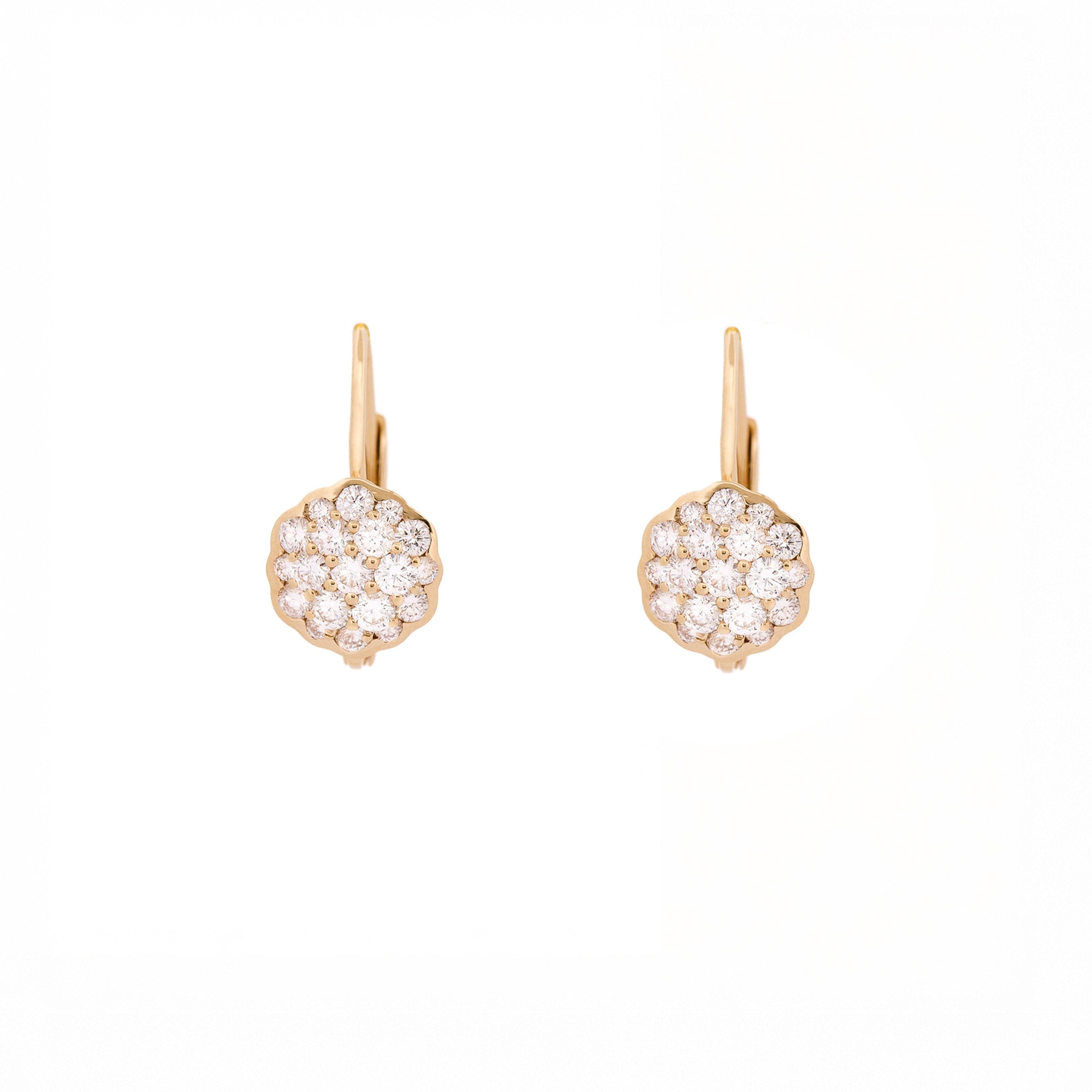Pair of gold earrings with a flower made of diamonds on a white background