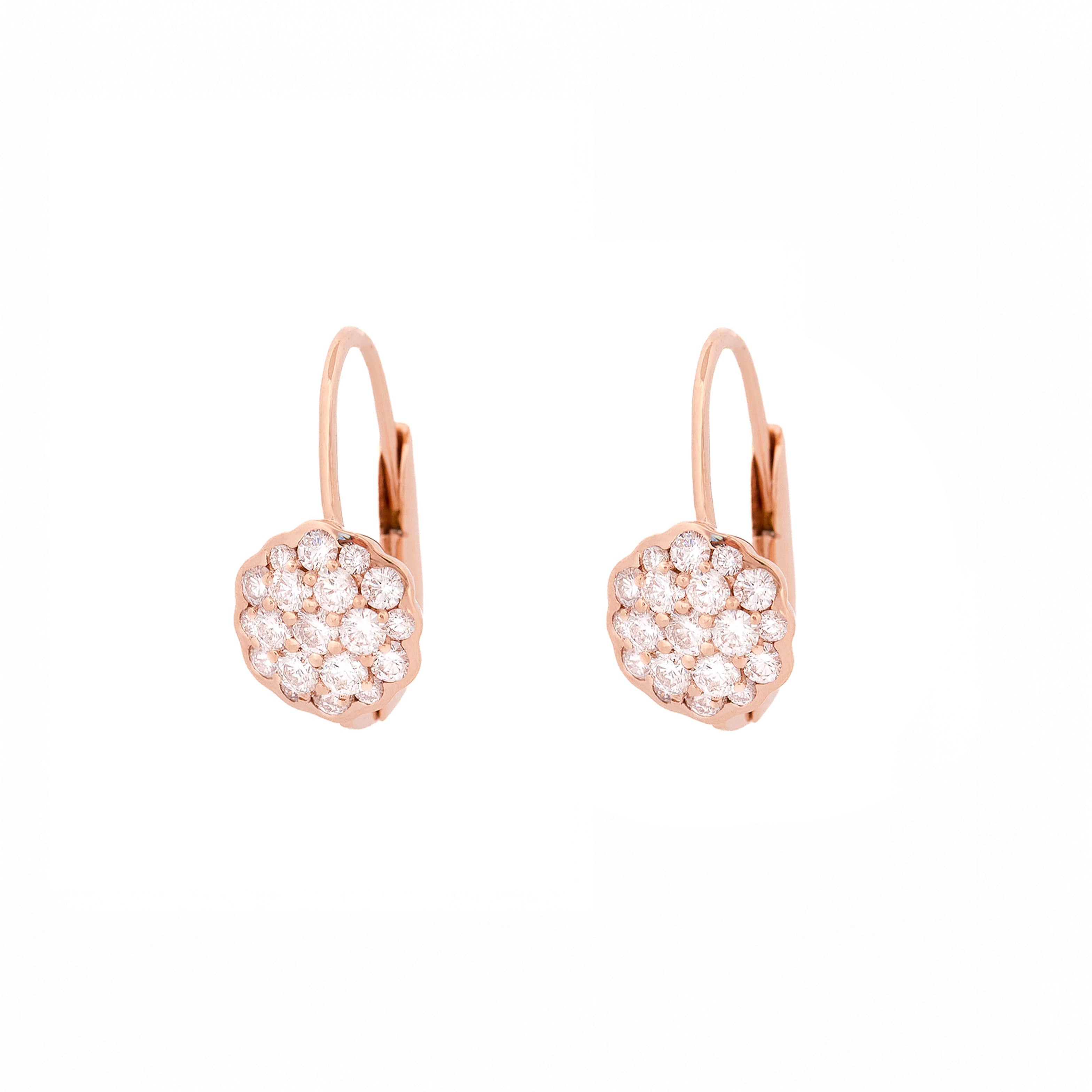 Pair of rose gold earrings with a flower made of diamonds on a white background
