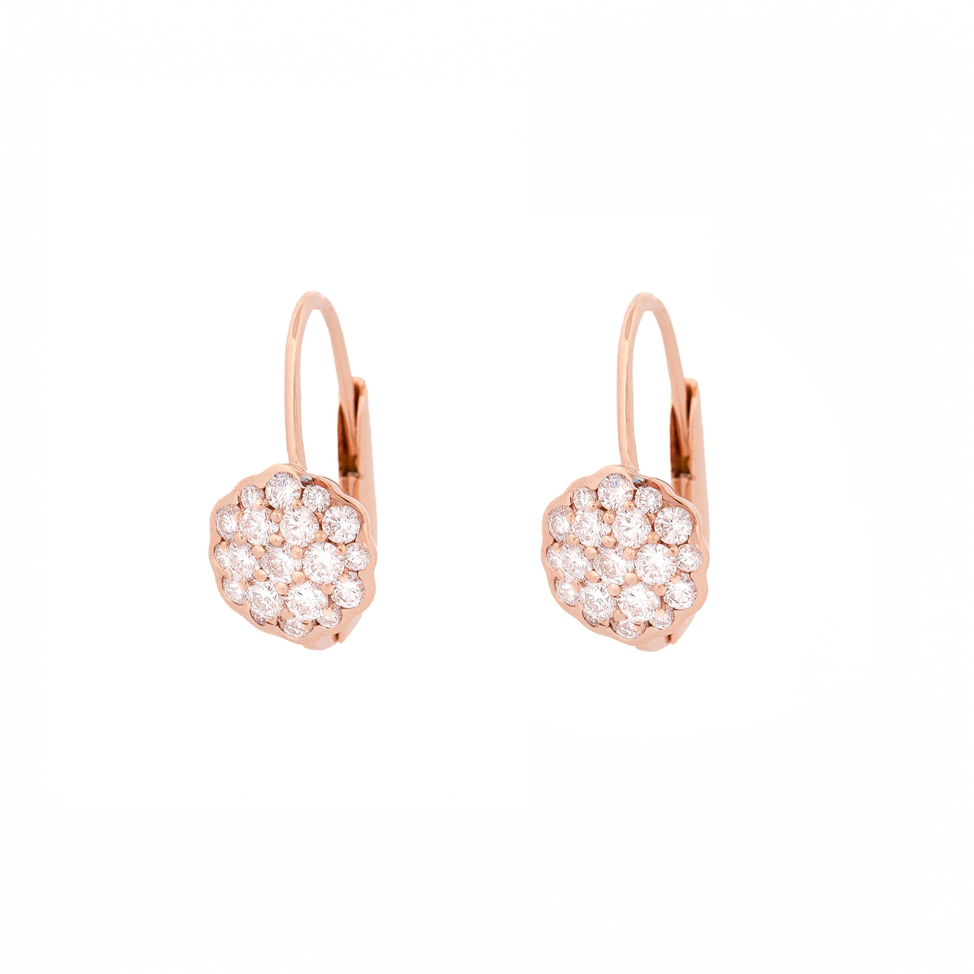 Pair of rose gold earrings with a flower made of diamonds on a white background