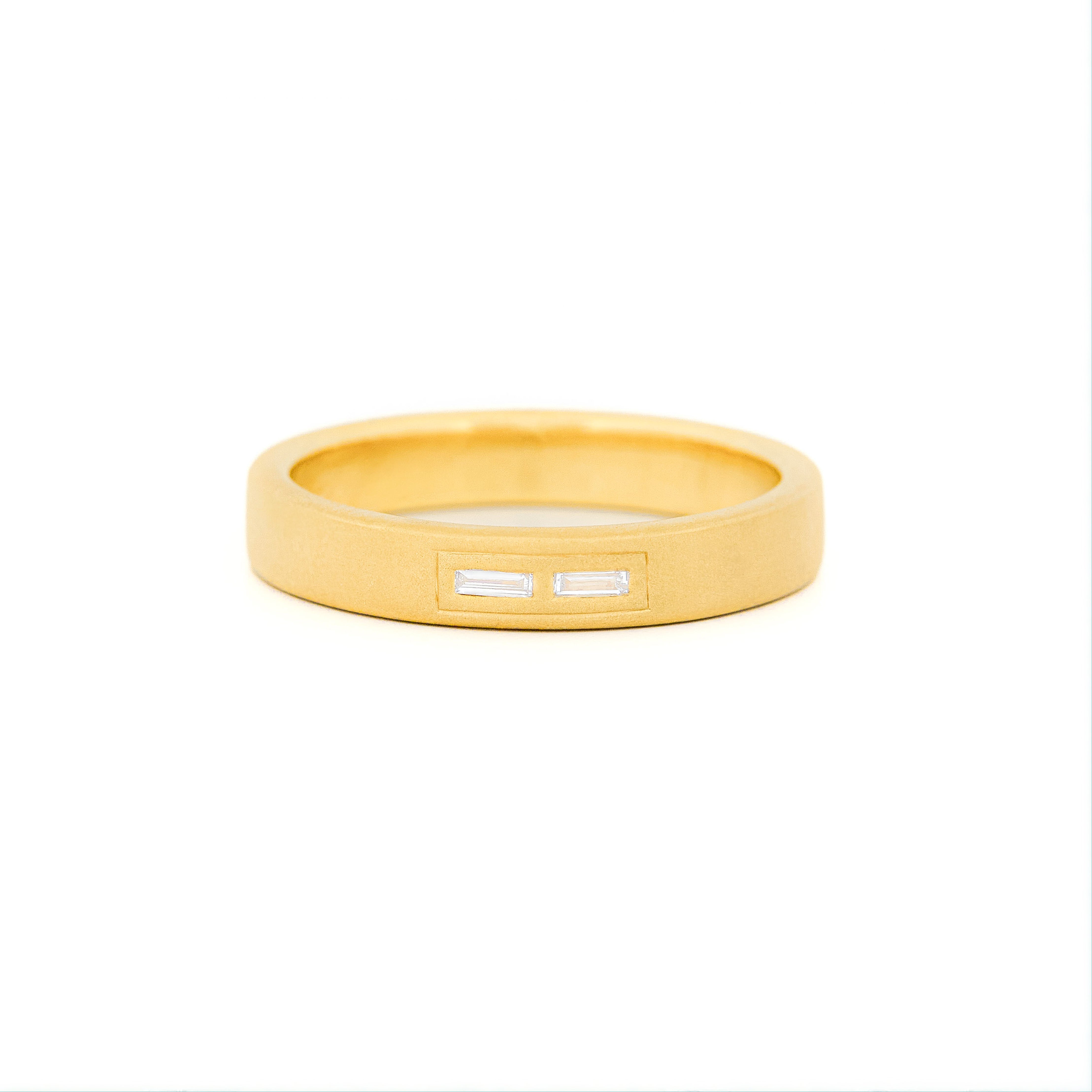 Gold 4 mm wedding band with bezel diamonds morse code.