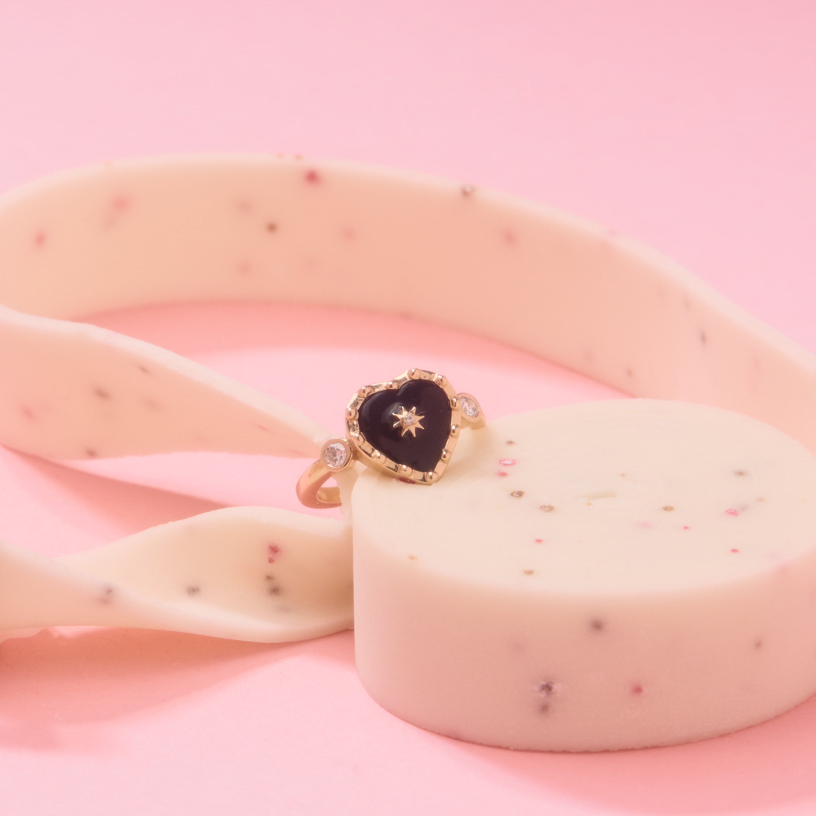 Heart shaped black onyx ring and 14k gold, with bezel diamonds, wear it for protection