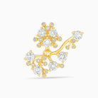 Gold and diamond bloom earring against a white background.