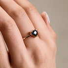 sapphire heart ring with blue stone on hand