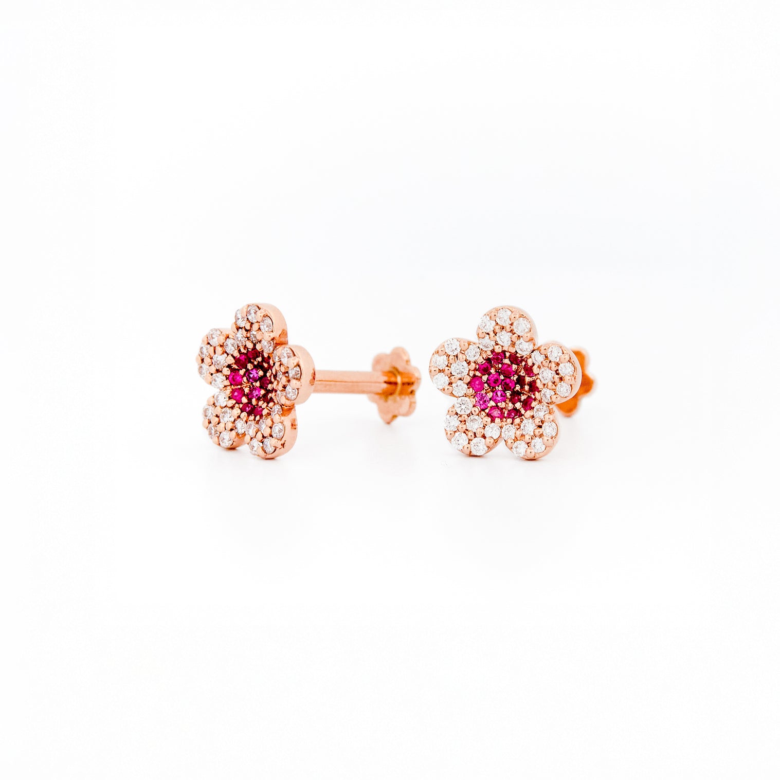 beautiful gold cherry blossom flower earrings on white background 