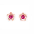 beautiful gold cherry blossom flower earrings on white background 