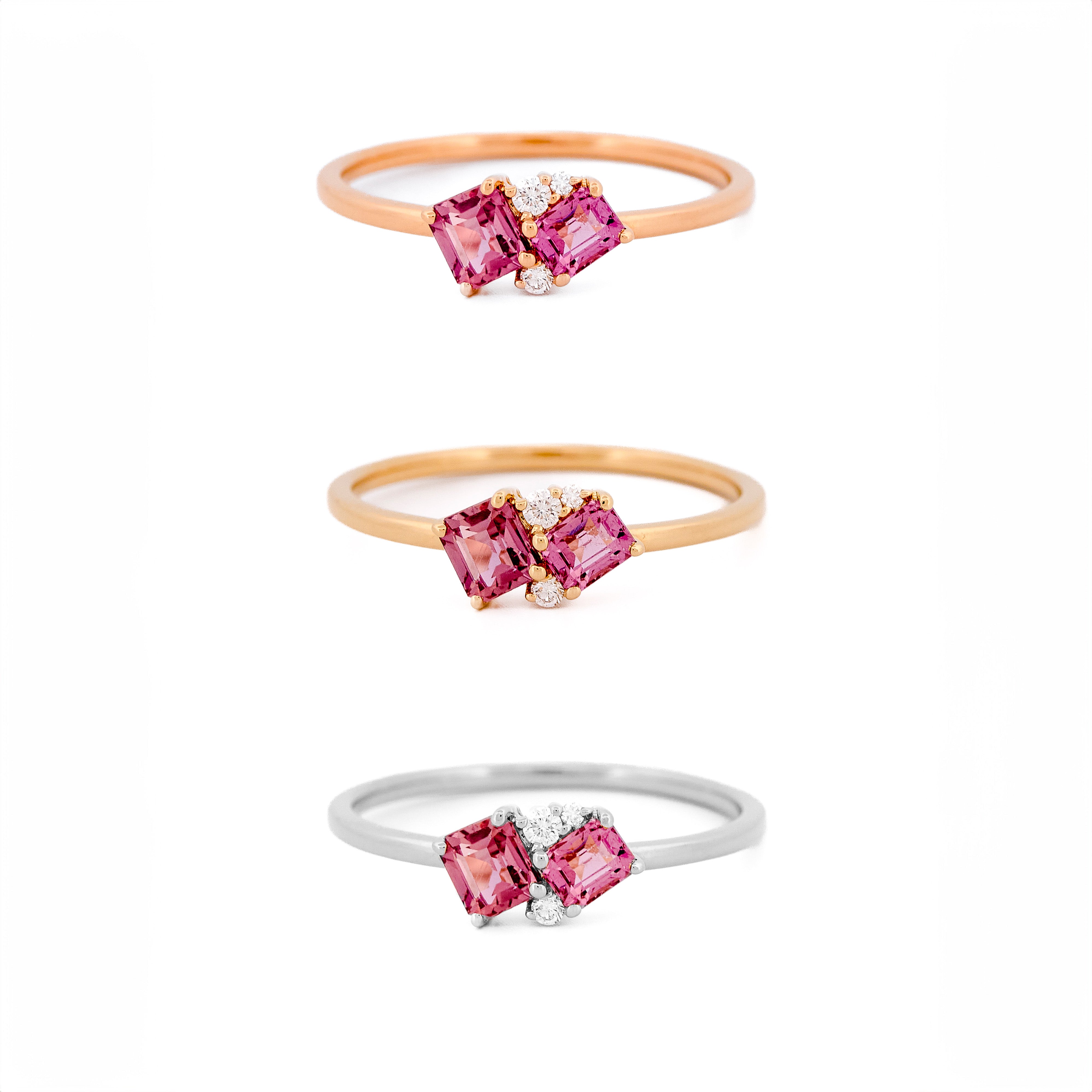 three gold rings with two pink sapphires and diamonds accents each, on a white background.