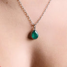 The Great - Emerald and diamonds pendant on model. Pandantul The Great cu smarald si diamante pe model. 