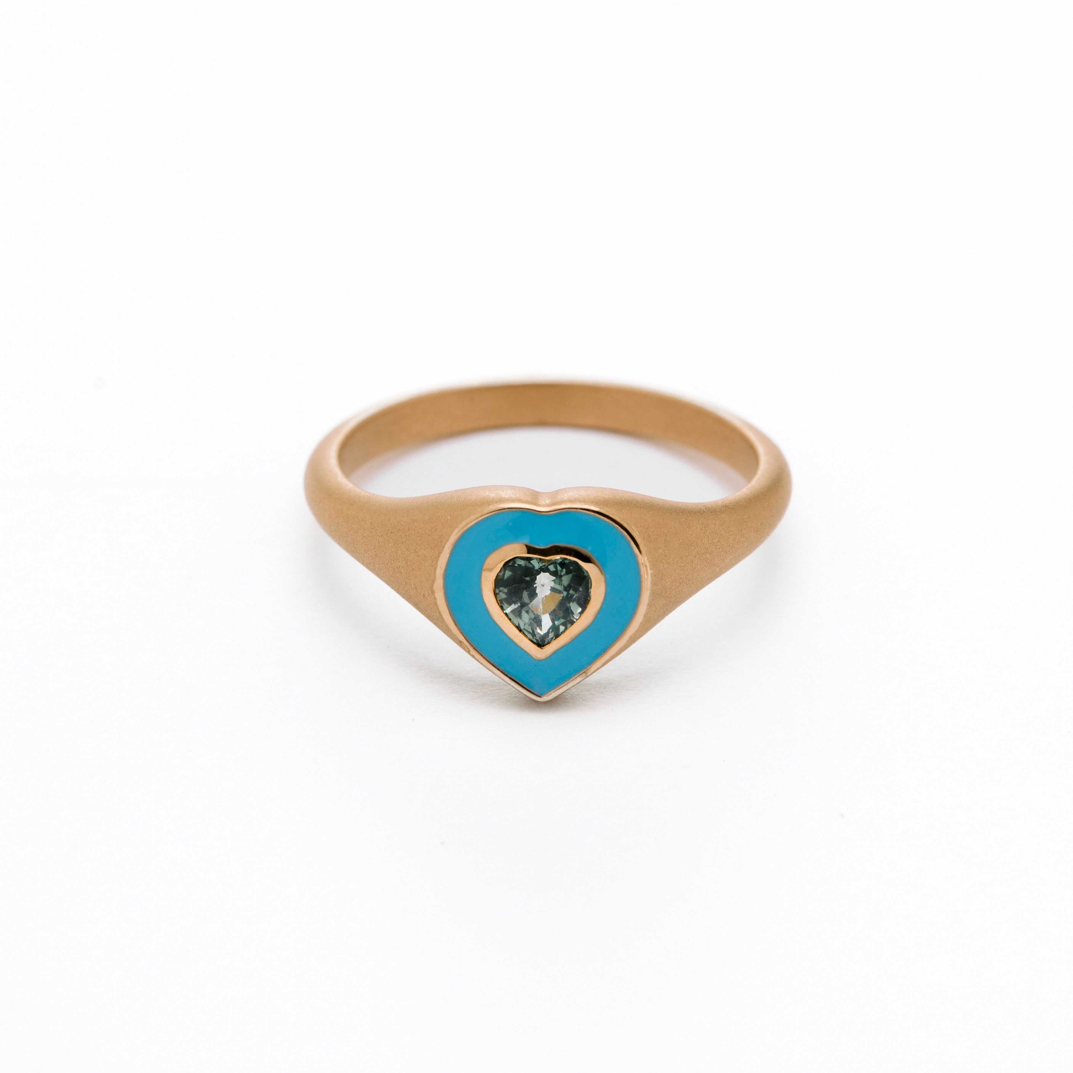  colorful enamel ring with sapphire green heart middle stone.