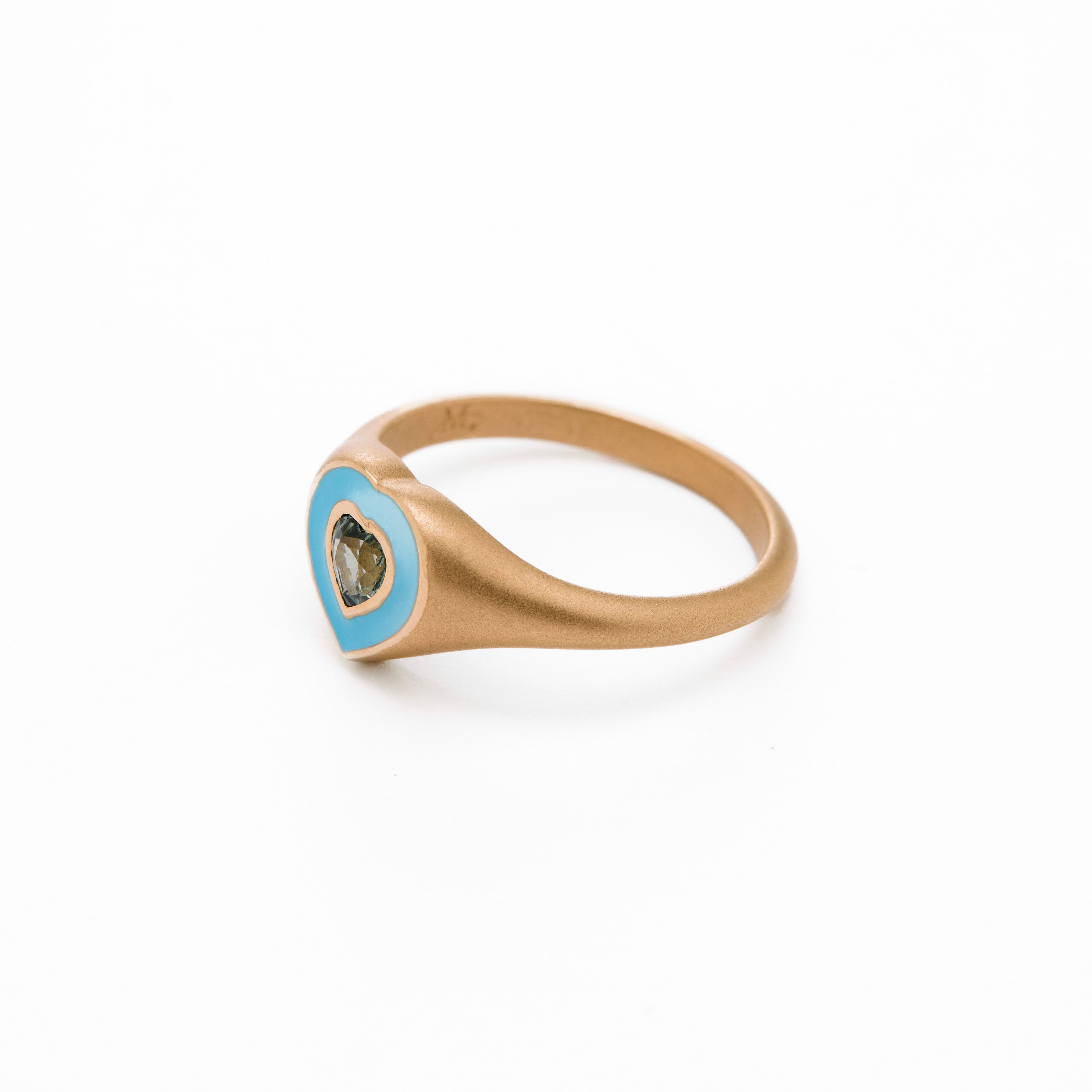  colorful enamel ring with sapphire green heart middle stone.