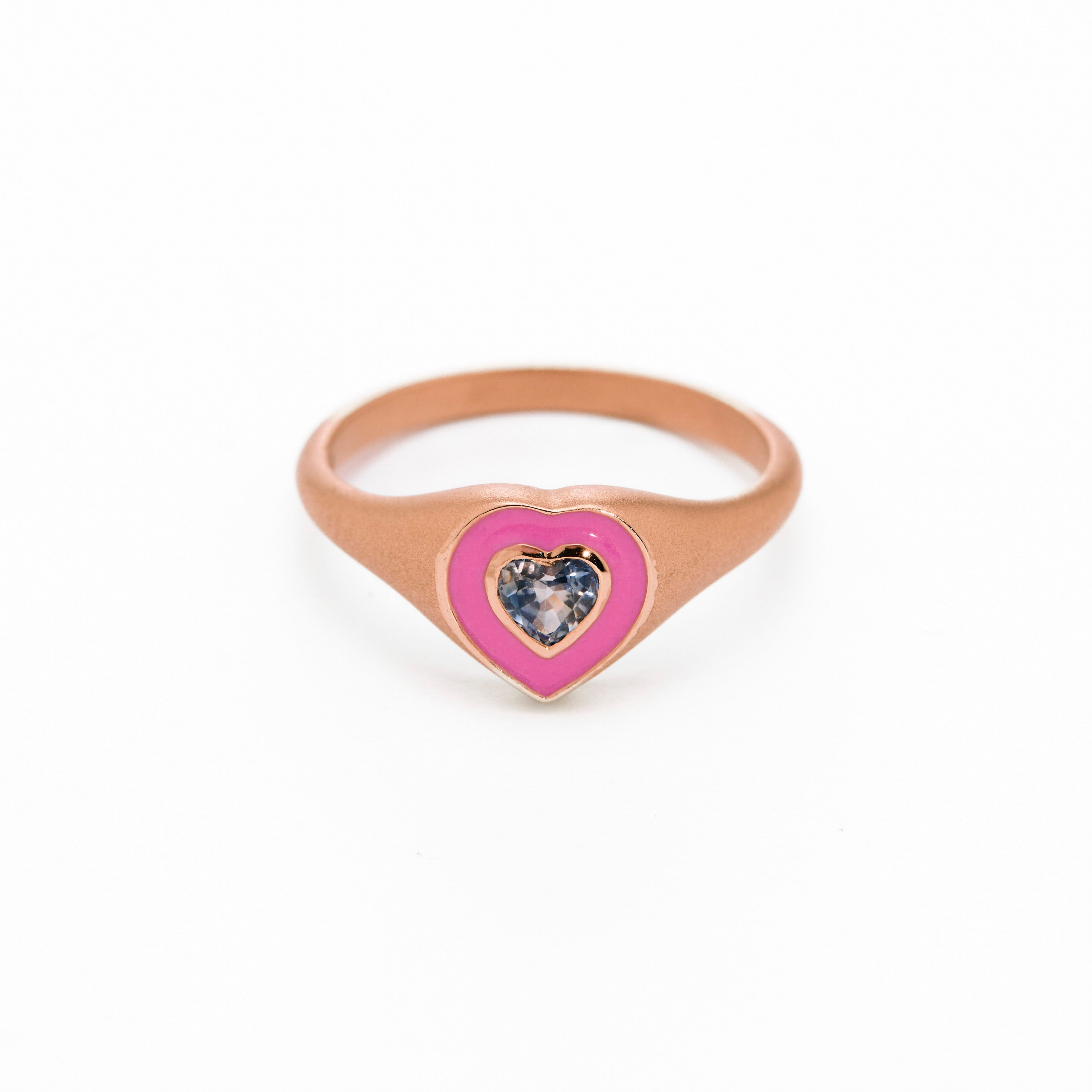 pink enamel ring with sapphire heart