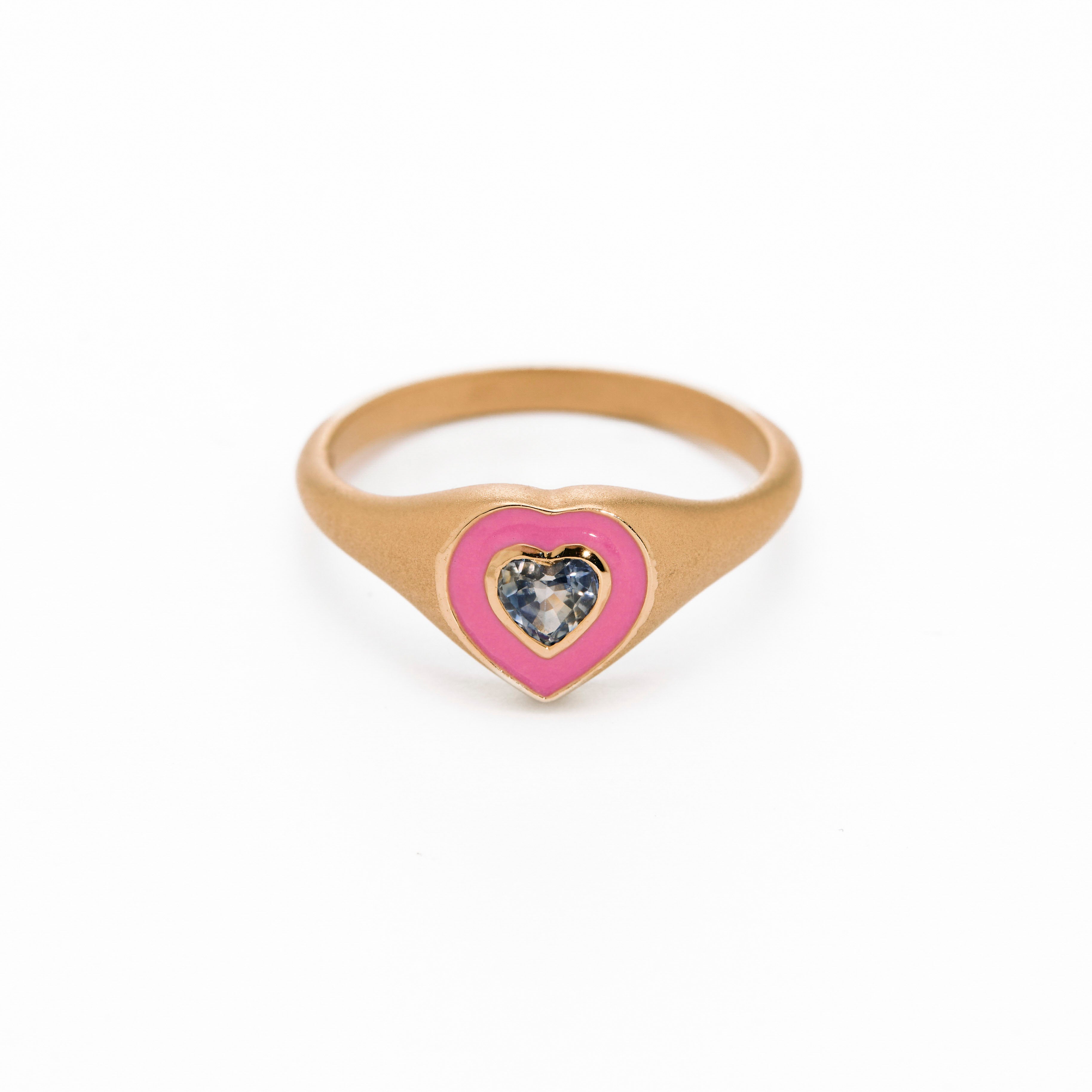 pink enamel ring with sapphire heart