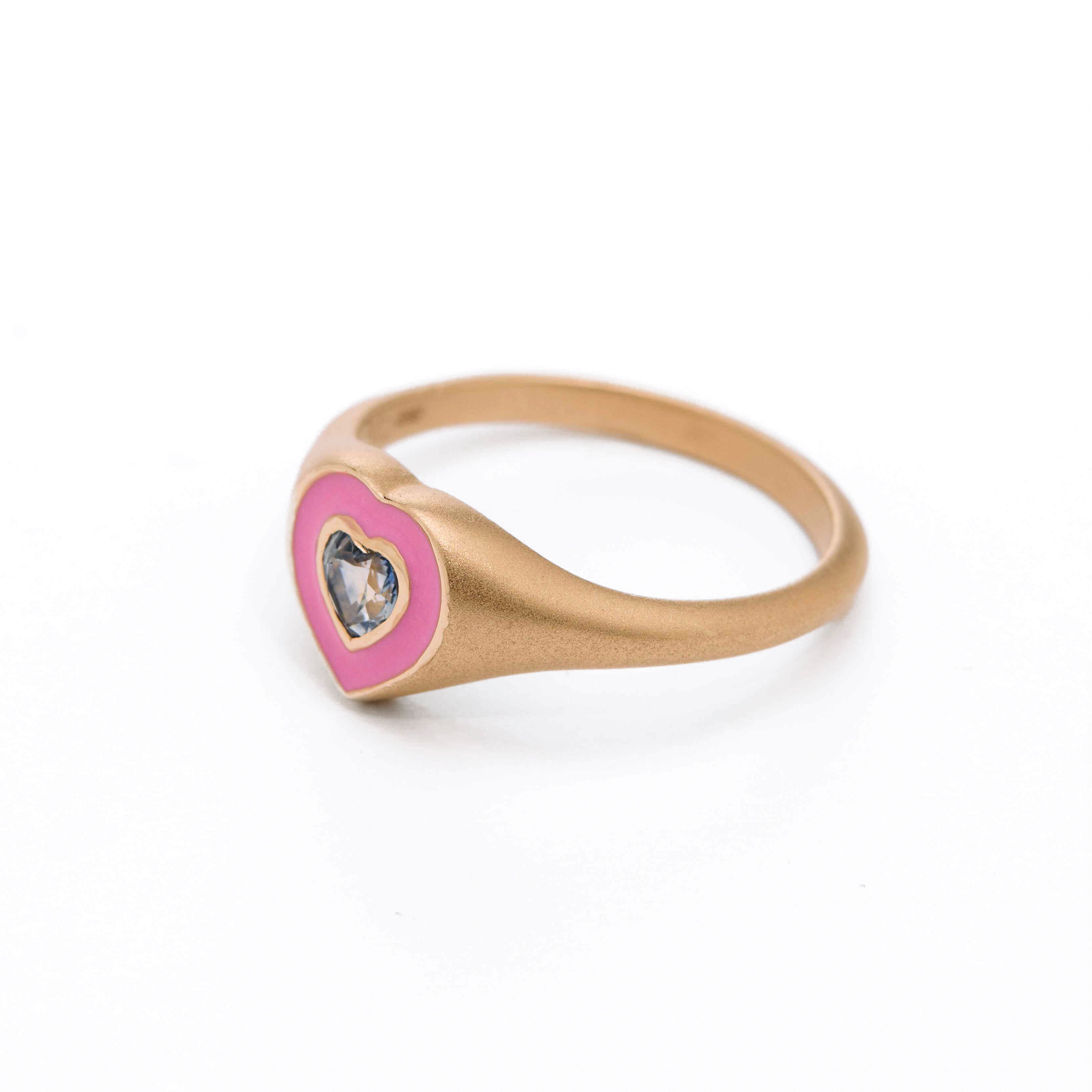 pink enamel ring with sapphire heart