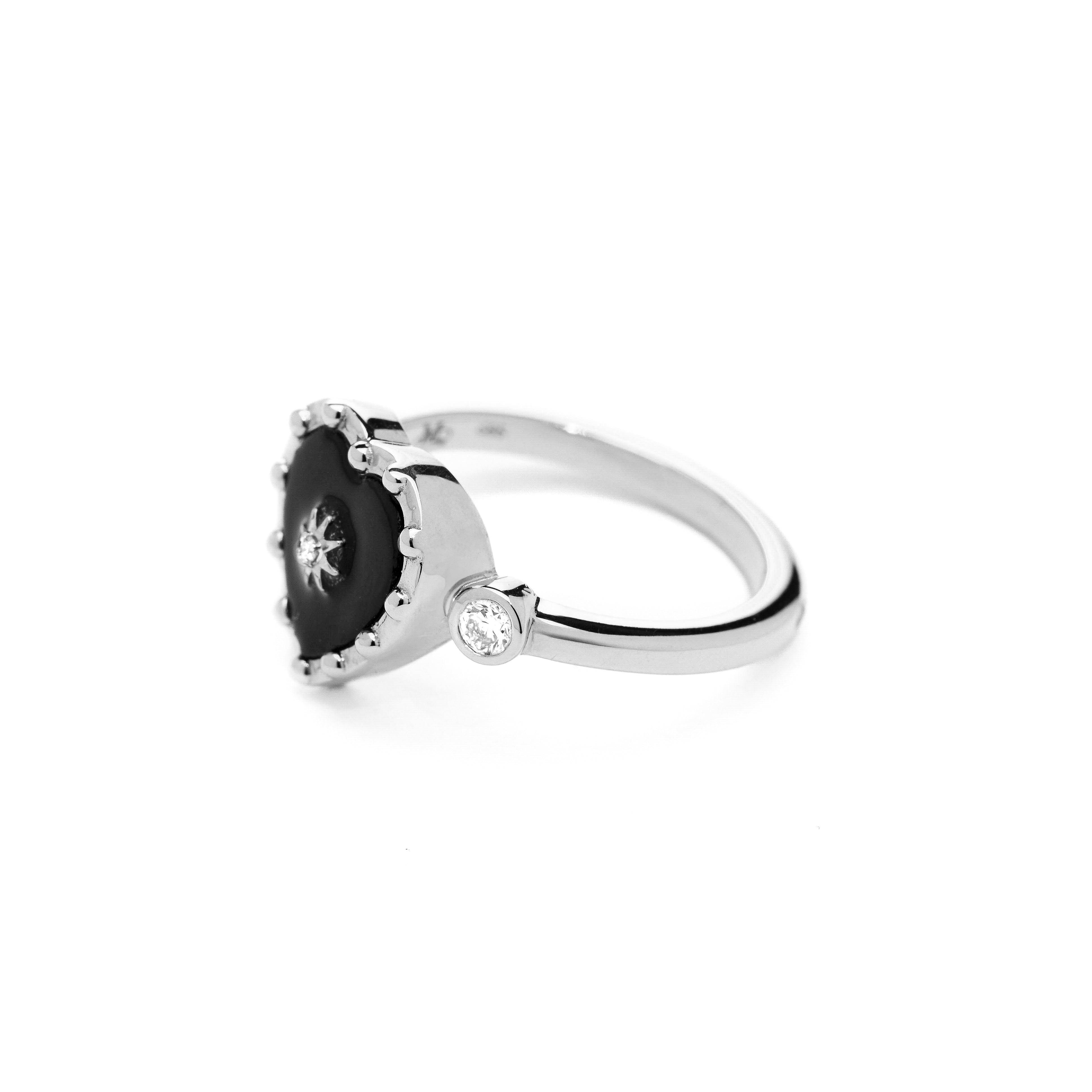 Heart shaped black onyx ring and 14k gold, with bezel diamonds, wear it for protection