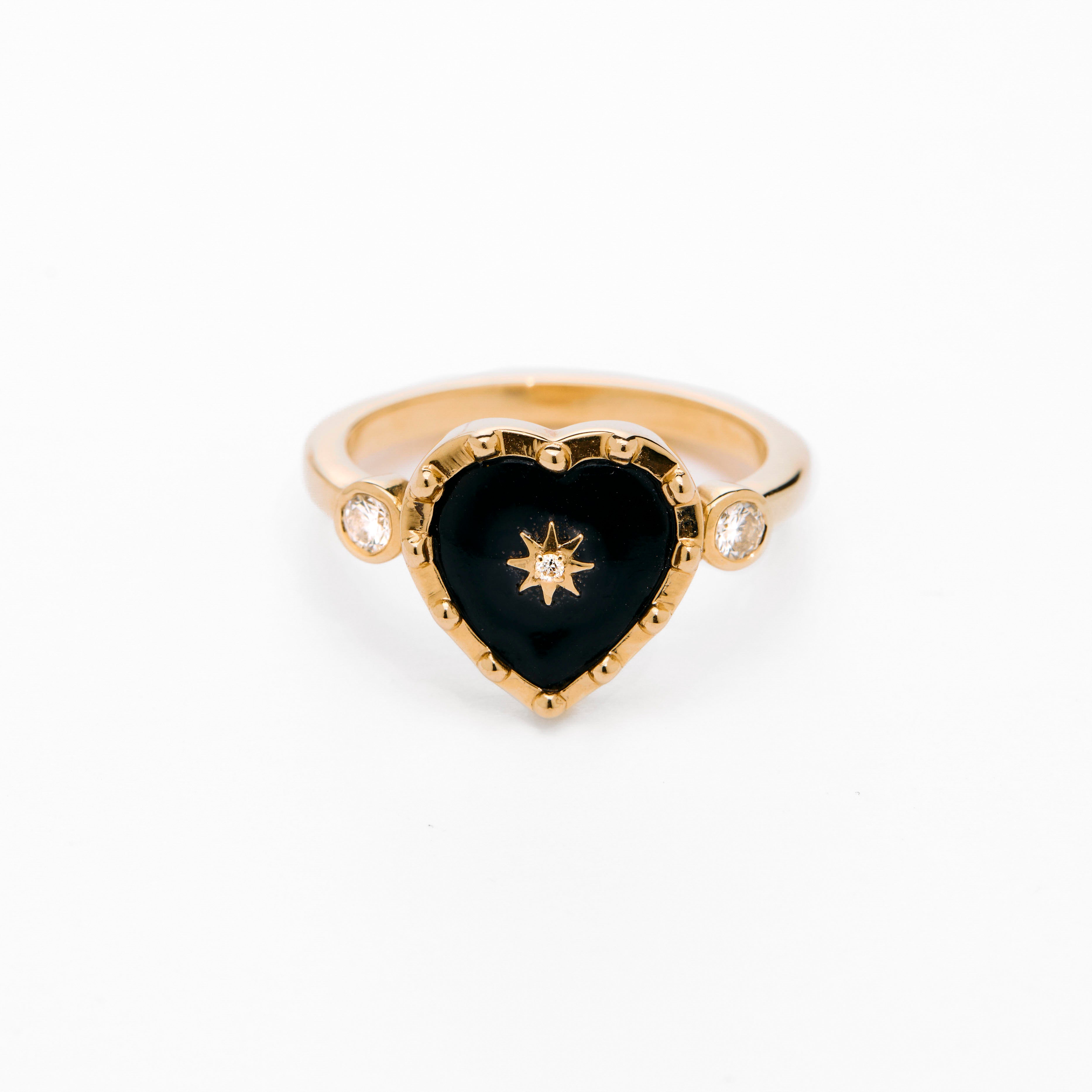 Heart shaped black onyx ring and 14k gold, with bezel diamonds, wear it for protection