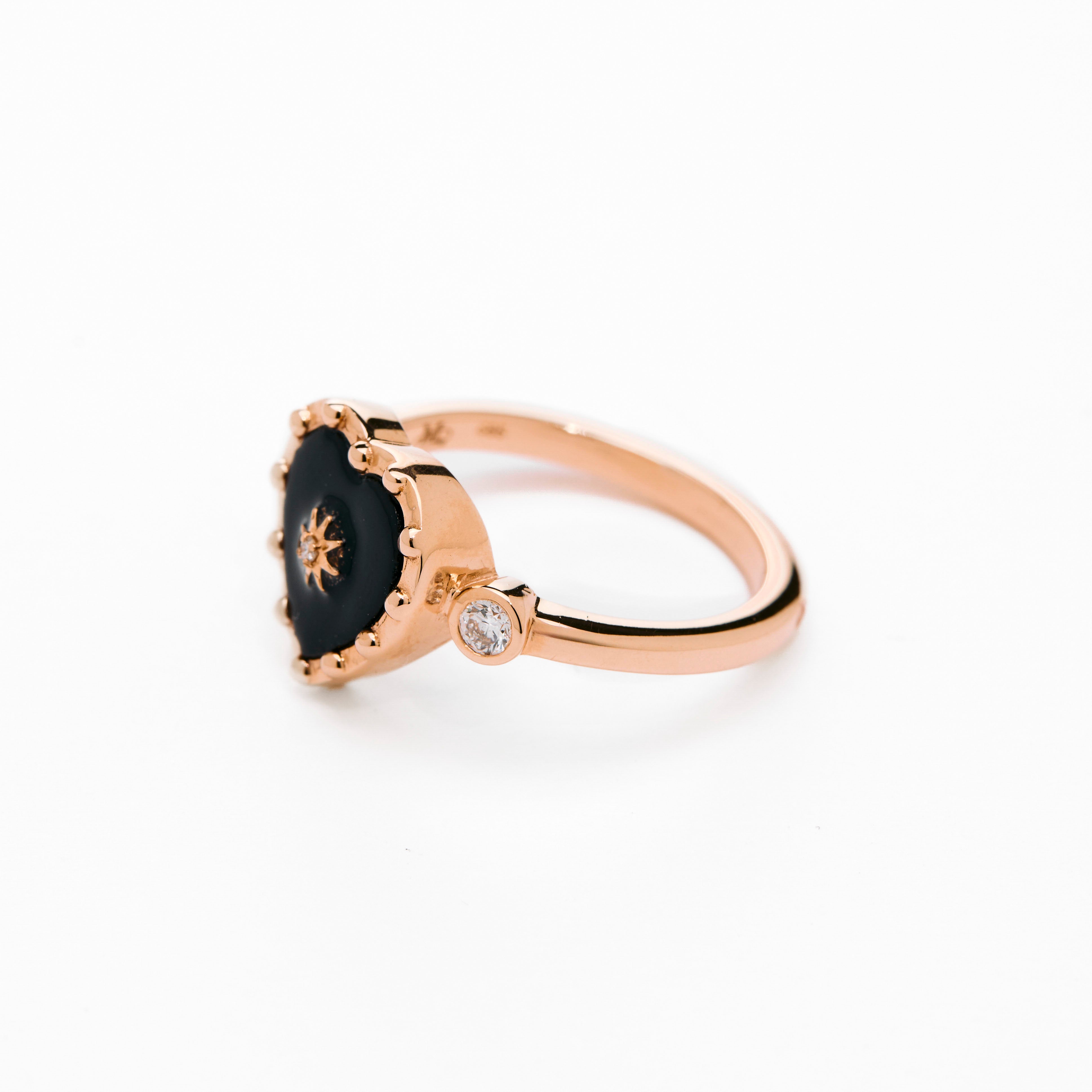 Heart shaped black onyx ring and 14k gold, with bezel diamonds, wear it for protection