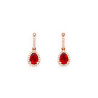 teardrop earring in red gold with diamonds and a teardrop fiery citrine 