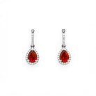 teardrop earring in white gold with diamonds and a teardrop fiery citrine 