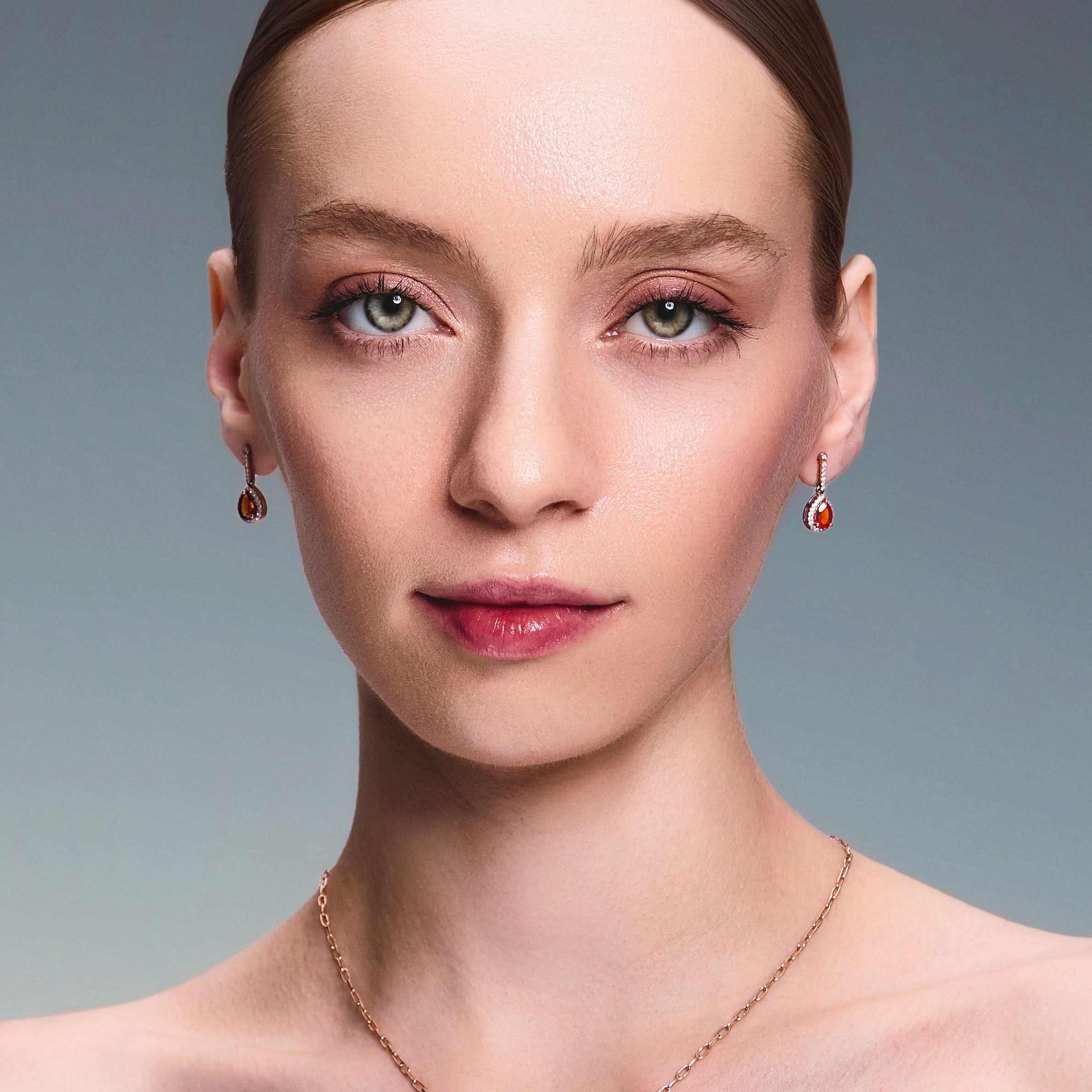 teardrop earring worn by beautiful model 