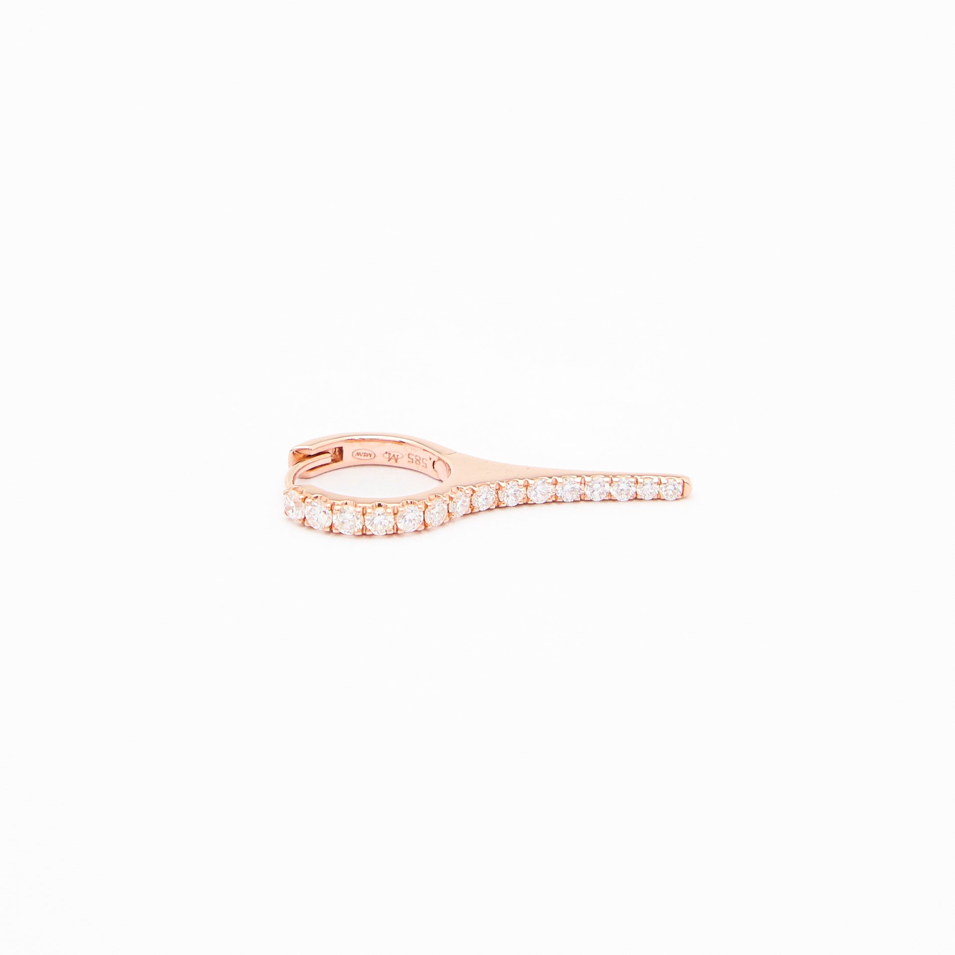 a rose gold earring with natural diamond drops, featuring a minimalist design.