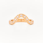 Yellow gold 2.5 mm band ring with 3 round diamondsdiamonds on a white background.