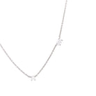 white gold necklace with small diamonds on a white background