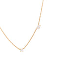 Gold necklace with diamonds on a white background