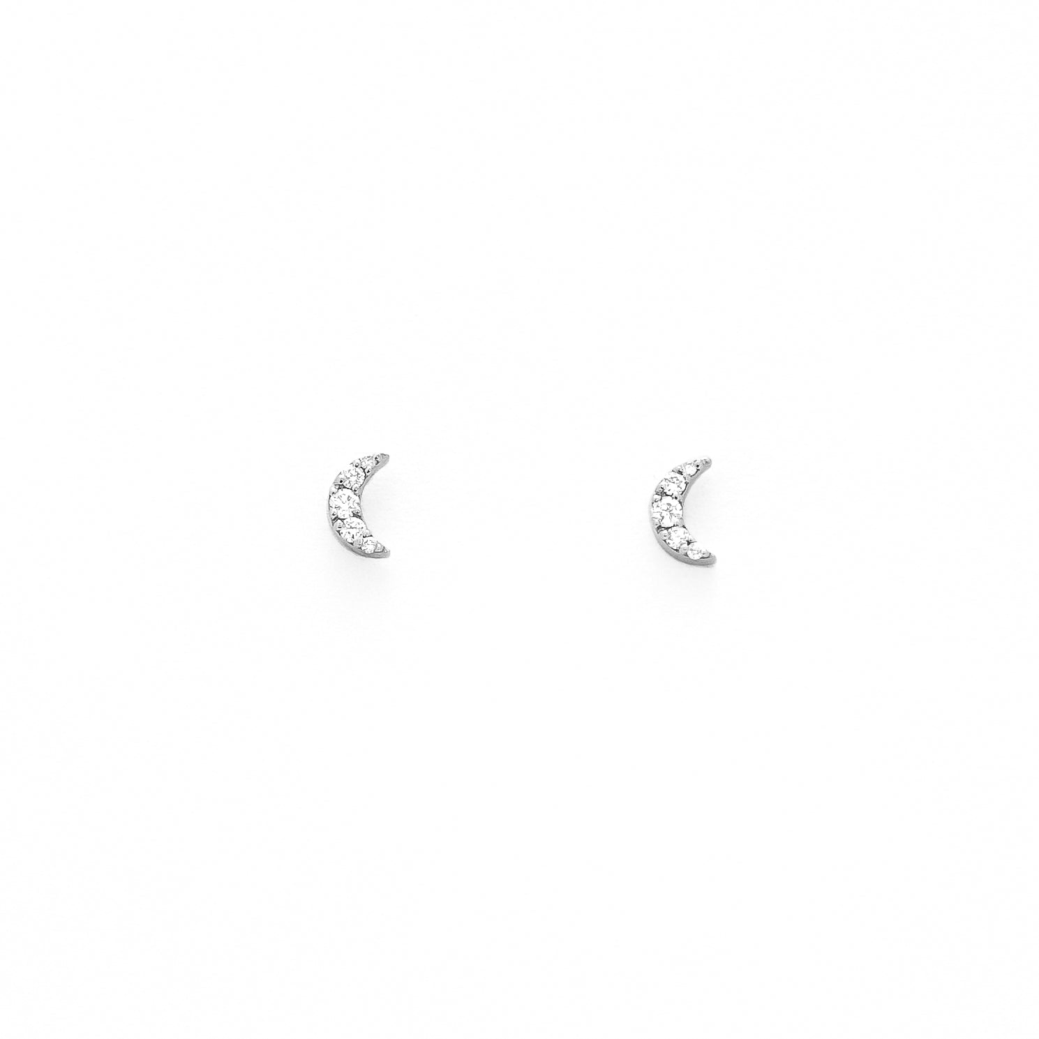  diamond stud earrings with a gold moon-shaped design.