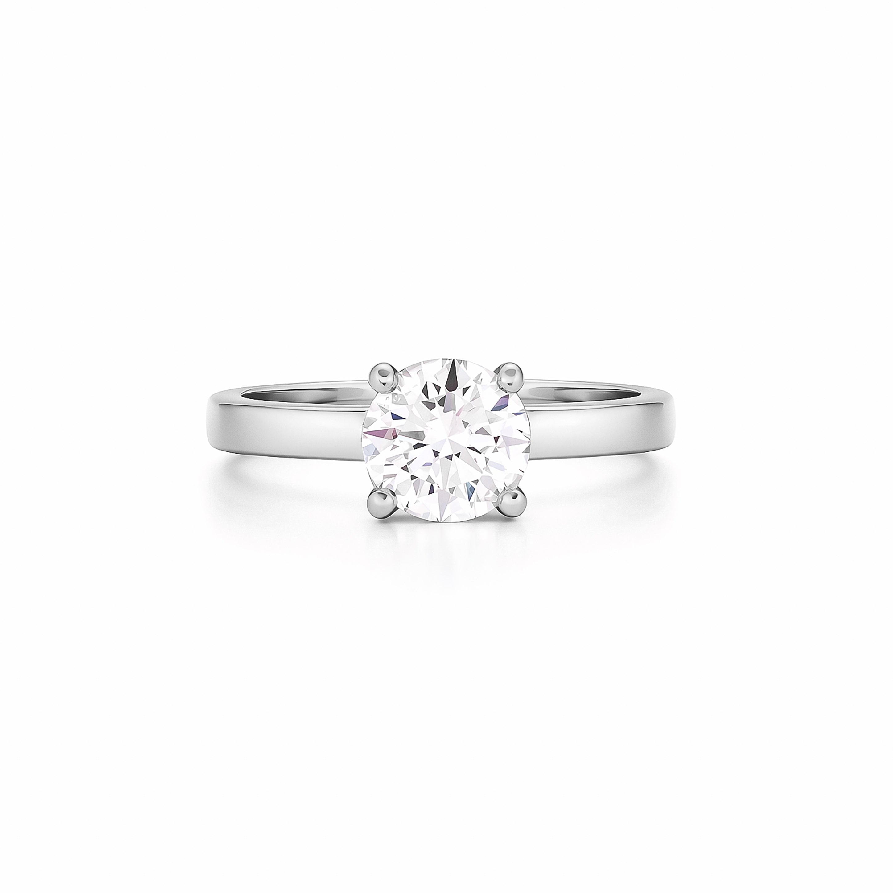 Solitaire gold ring with a 1 ct natural diamond, on a white background