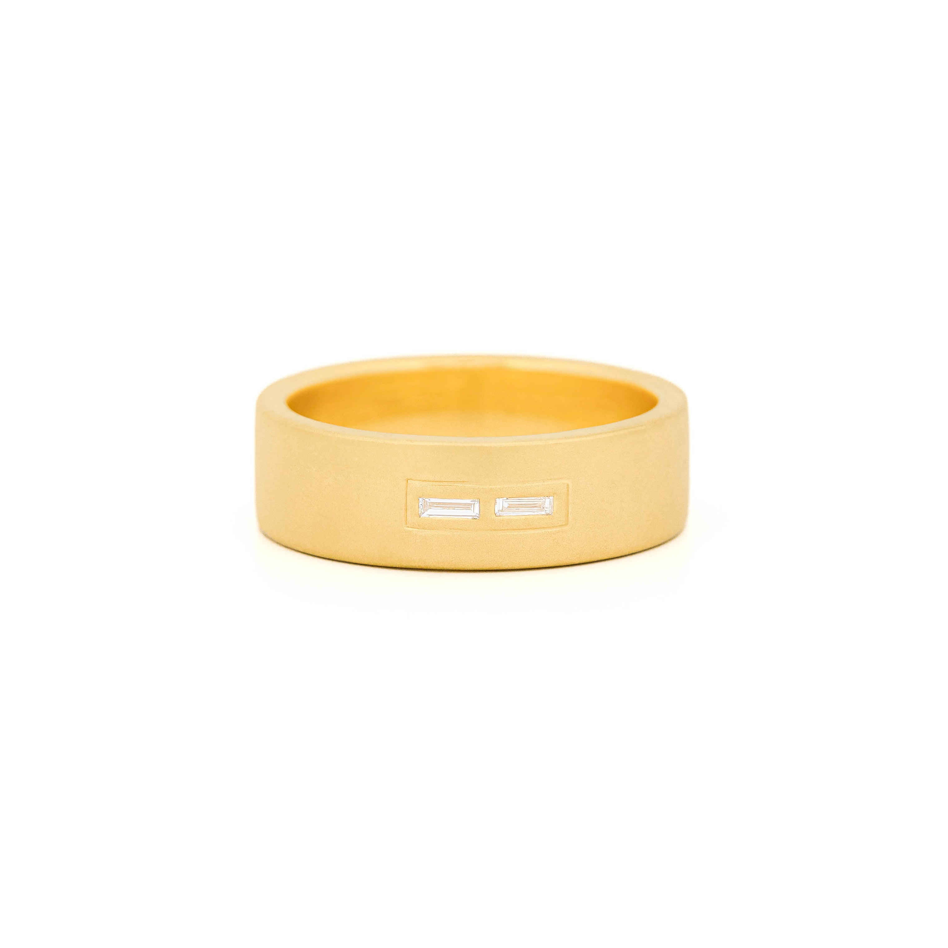 Gold 7mm wedding band with bezel diamonds morse code.