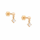 Yellow gold earrings with round diamonds on a white background