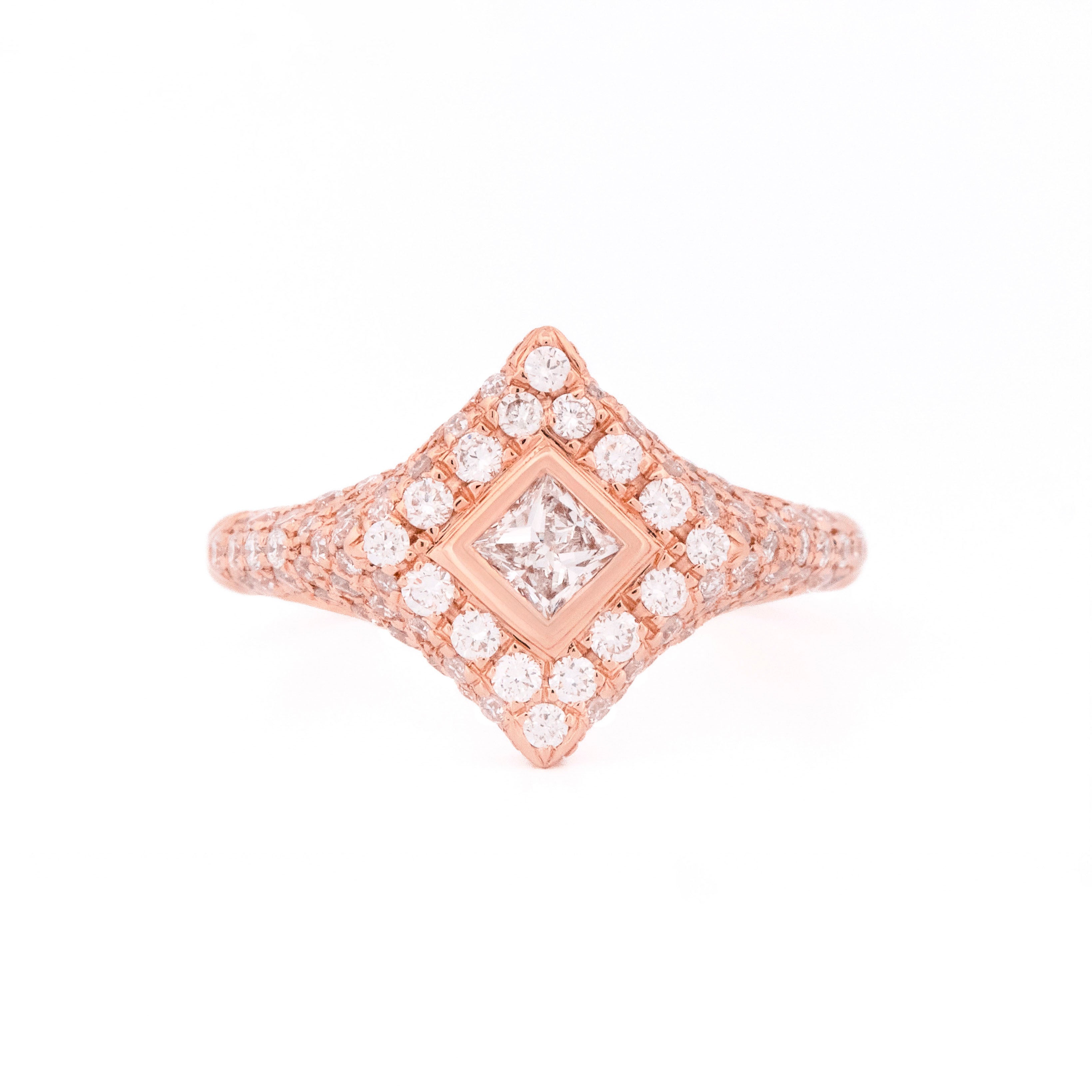 Rose gold ring with diamonds, rhombus and round shaped, on a white background