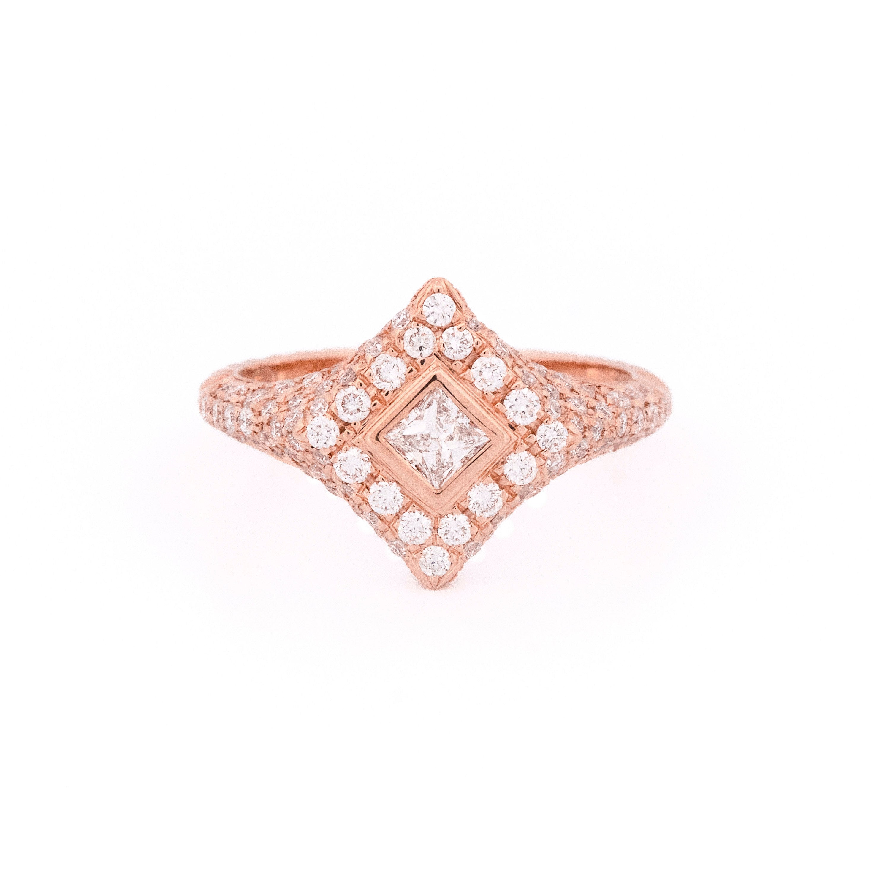 Rose gold ring with diamonds, rhombus and round shaped, on a white background