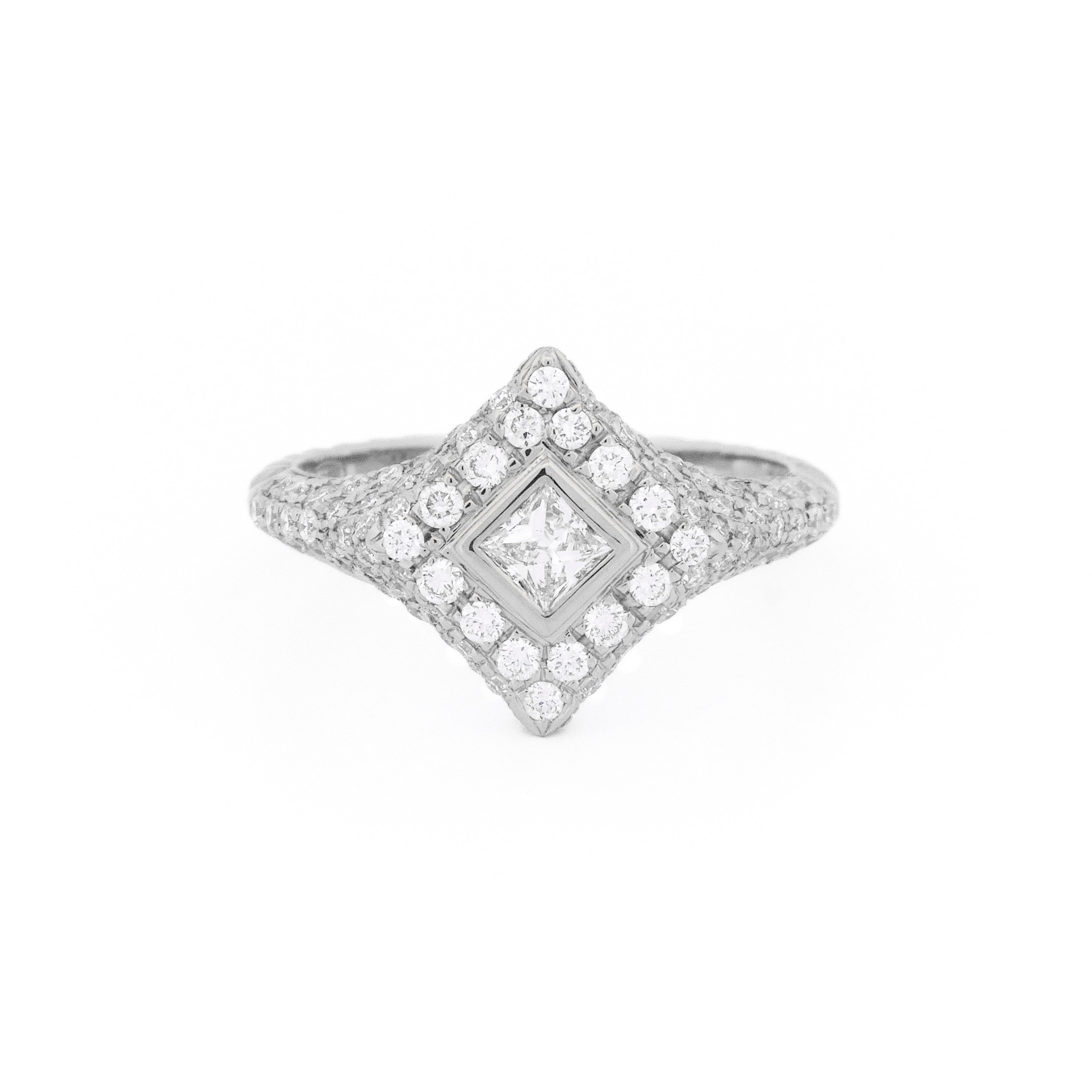 White gold ring with diamonds, rhombus and round shaped, on a white background