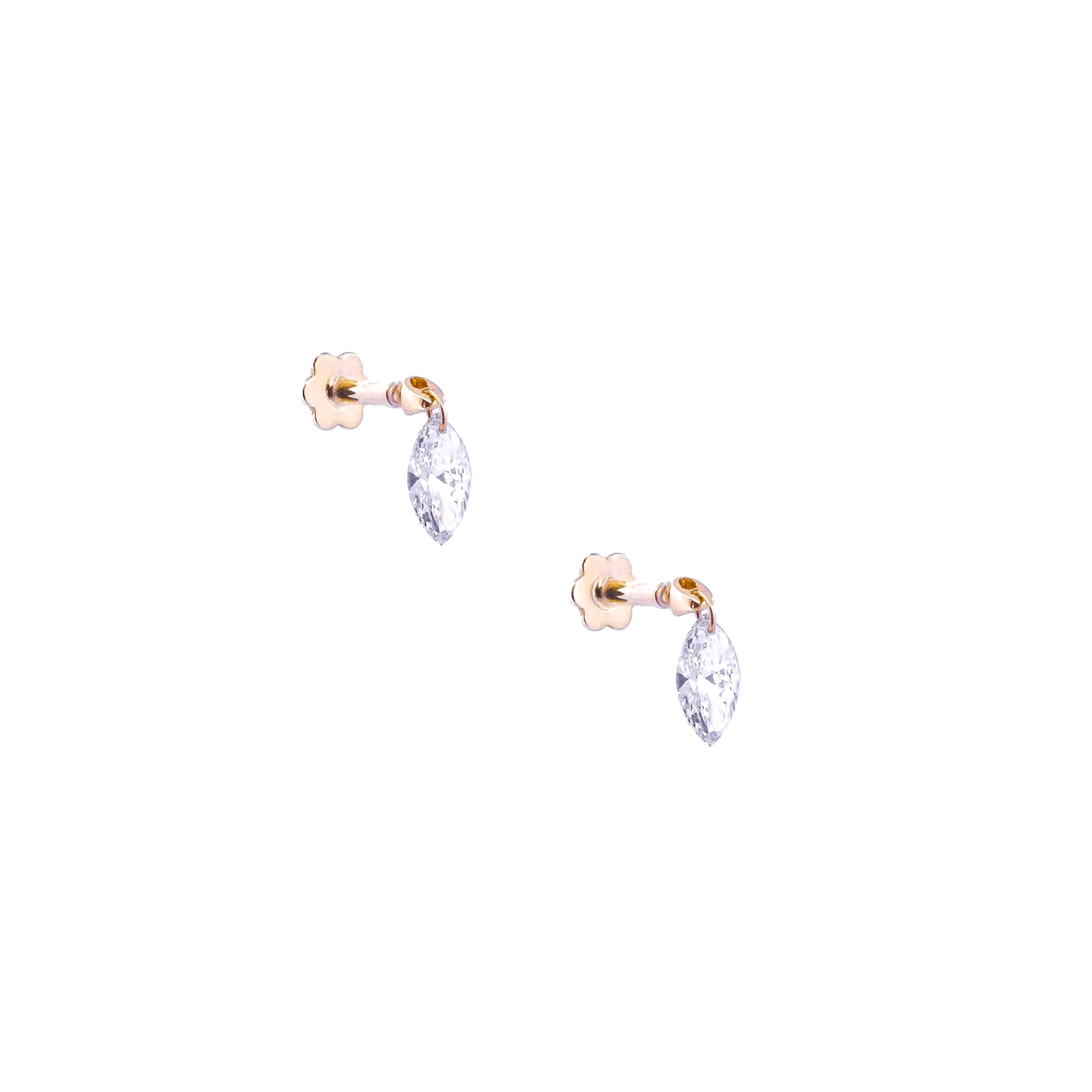 Pair of white gold earrings with floating diamonds on a white background